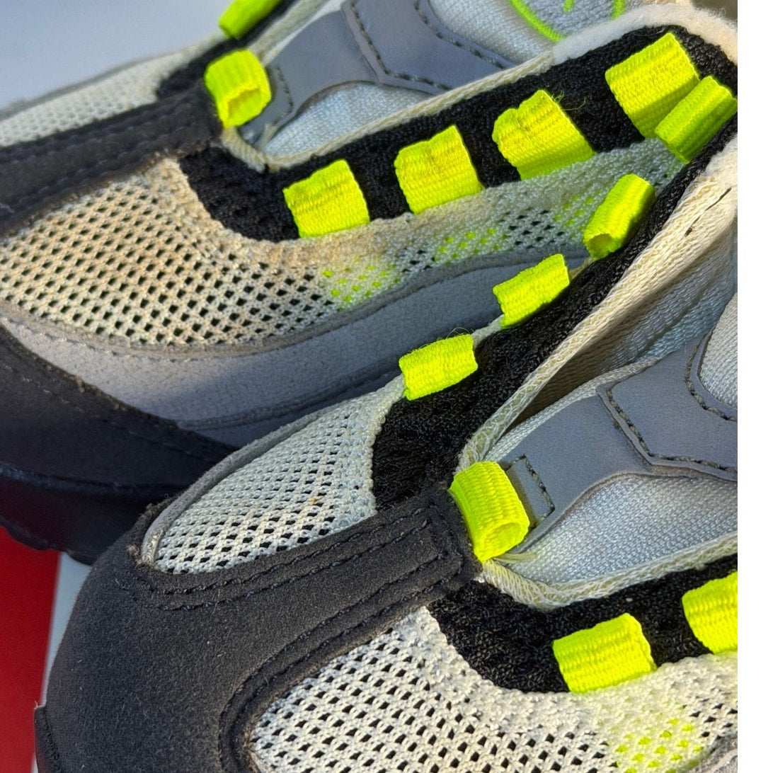 Nike Air Max 95 toddler sneakers in gray, volt, and black, featuring sporty running shoe design for kids.