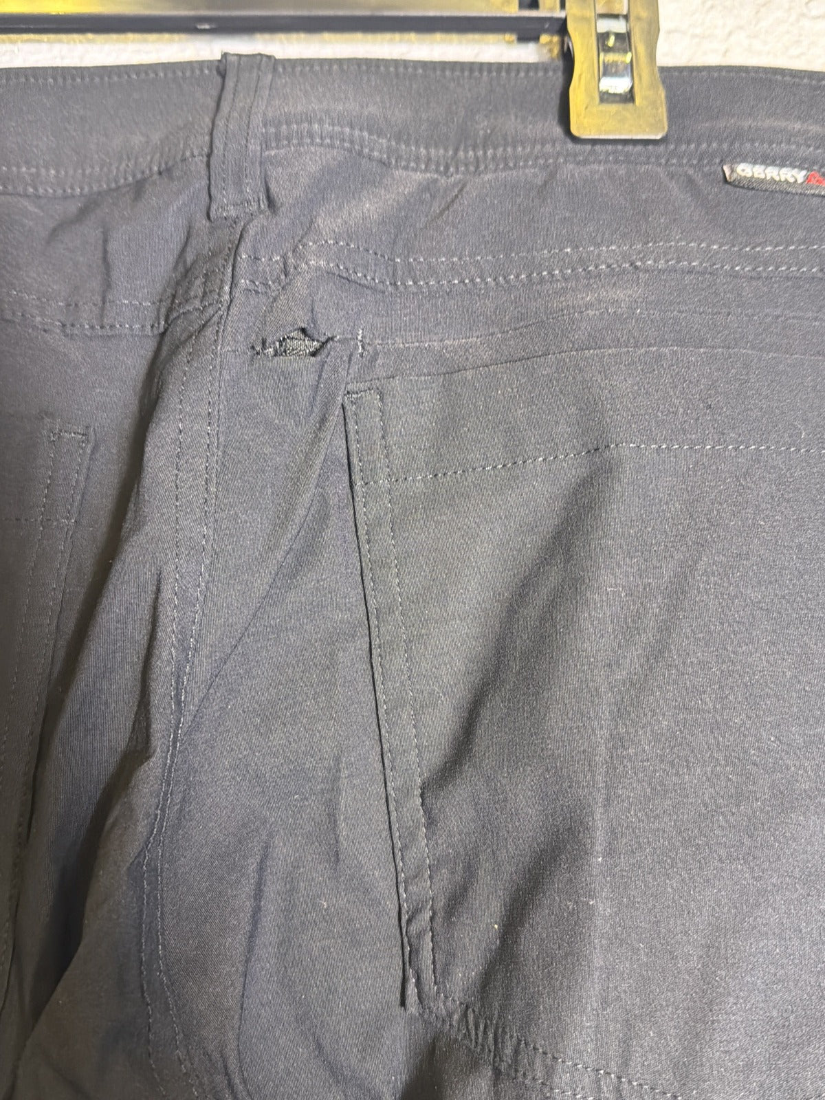 Gerry men's black fleece-lined stretch pants in size 32x32 laid flat, showing the comfortable fit and fabric texture.