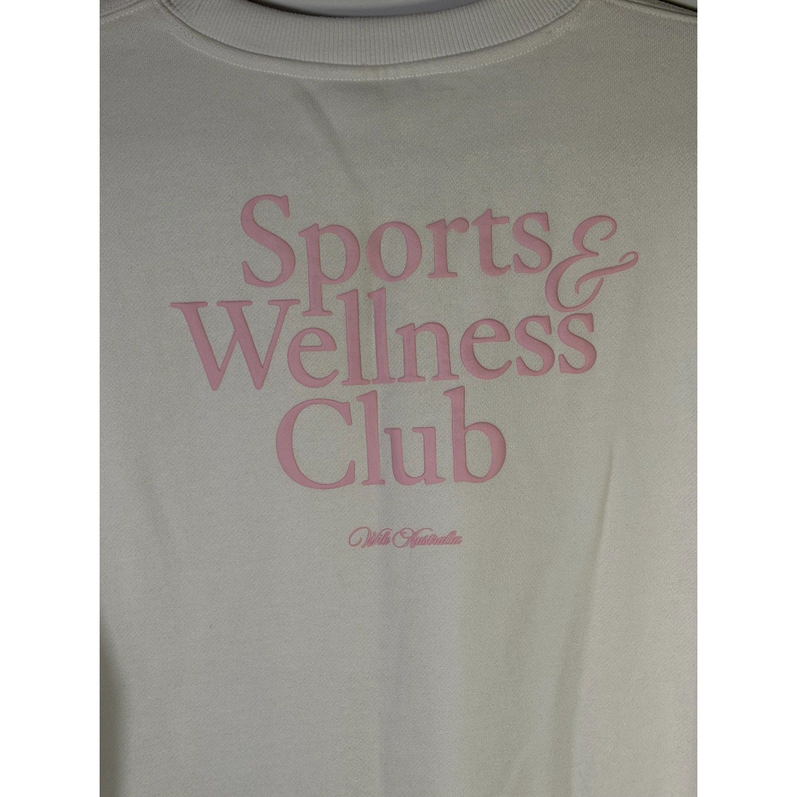 WILO The Label sports and wellness club crewneck sweatshirt in white and pink, medium size, with a soft cotton fabric.