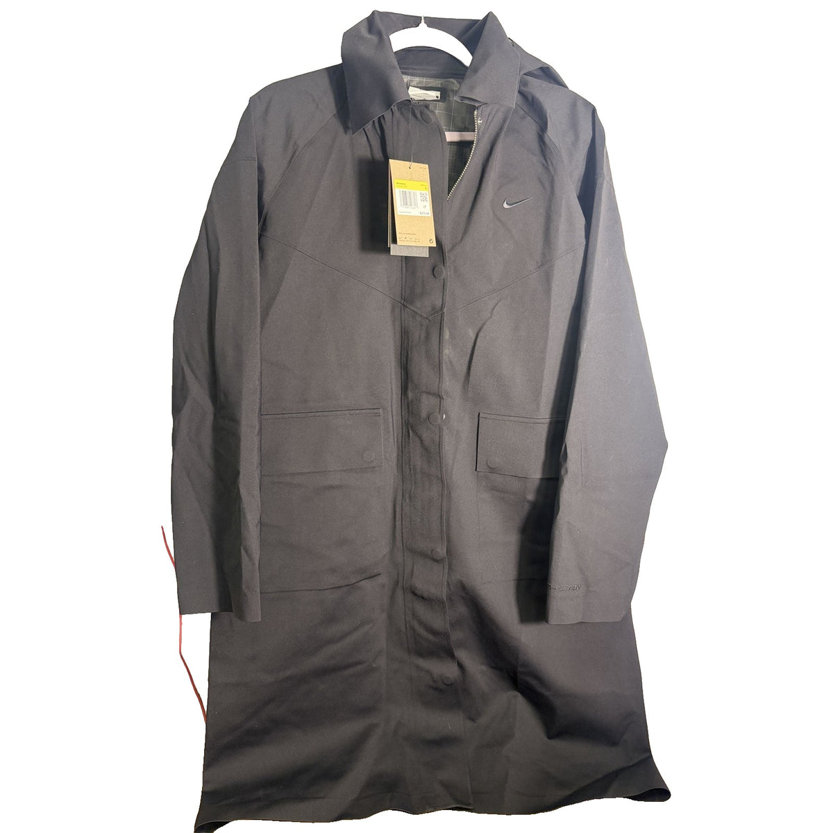 Nike Storm-FIT ADV long trench coat in black, women's small size, lightweight waterproof jacket with a sleek design.