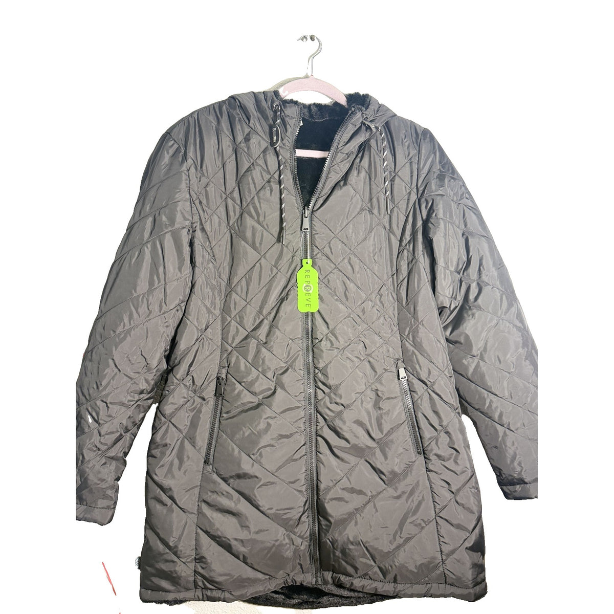 Free Country Cloud Lite reversible quilted faux fur hooded jacket in black, women's large size, displayed with hood and quilted design.