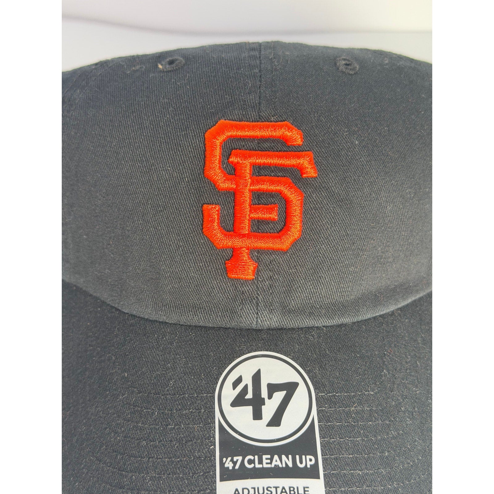 Black '47 San Francisco Giants Clean Up adjustable dad hat with curved brim and embroidered team logo front.