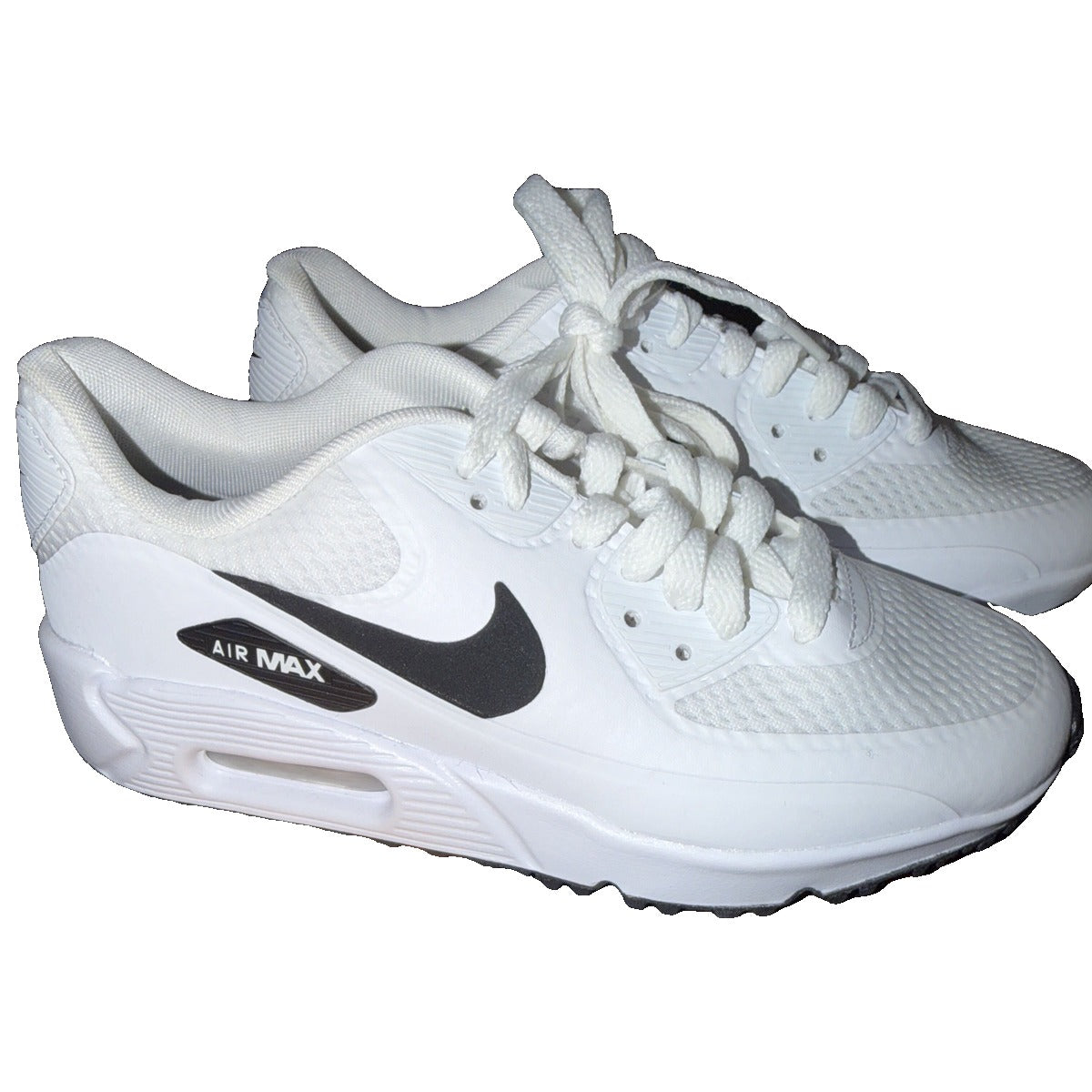 Nike Air Max 90 G golf shoes in white and black for men and women, new without box, shown from the side.