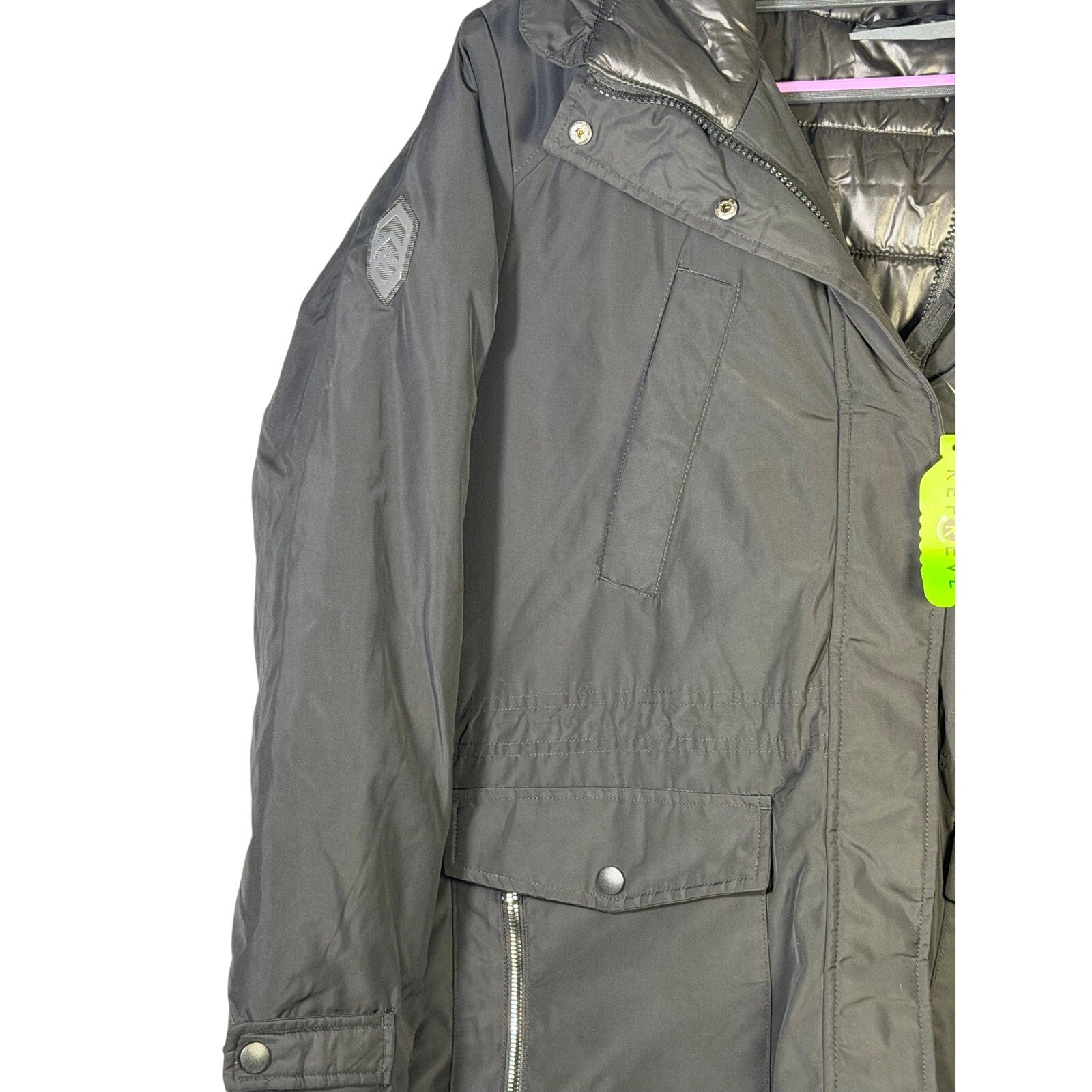 Black Free Country Women’s Arctic Series Anorak Jacket with hood, long coat style, shown from the front.