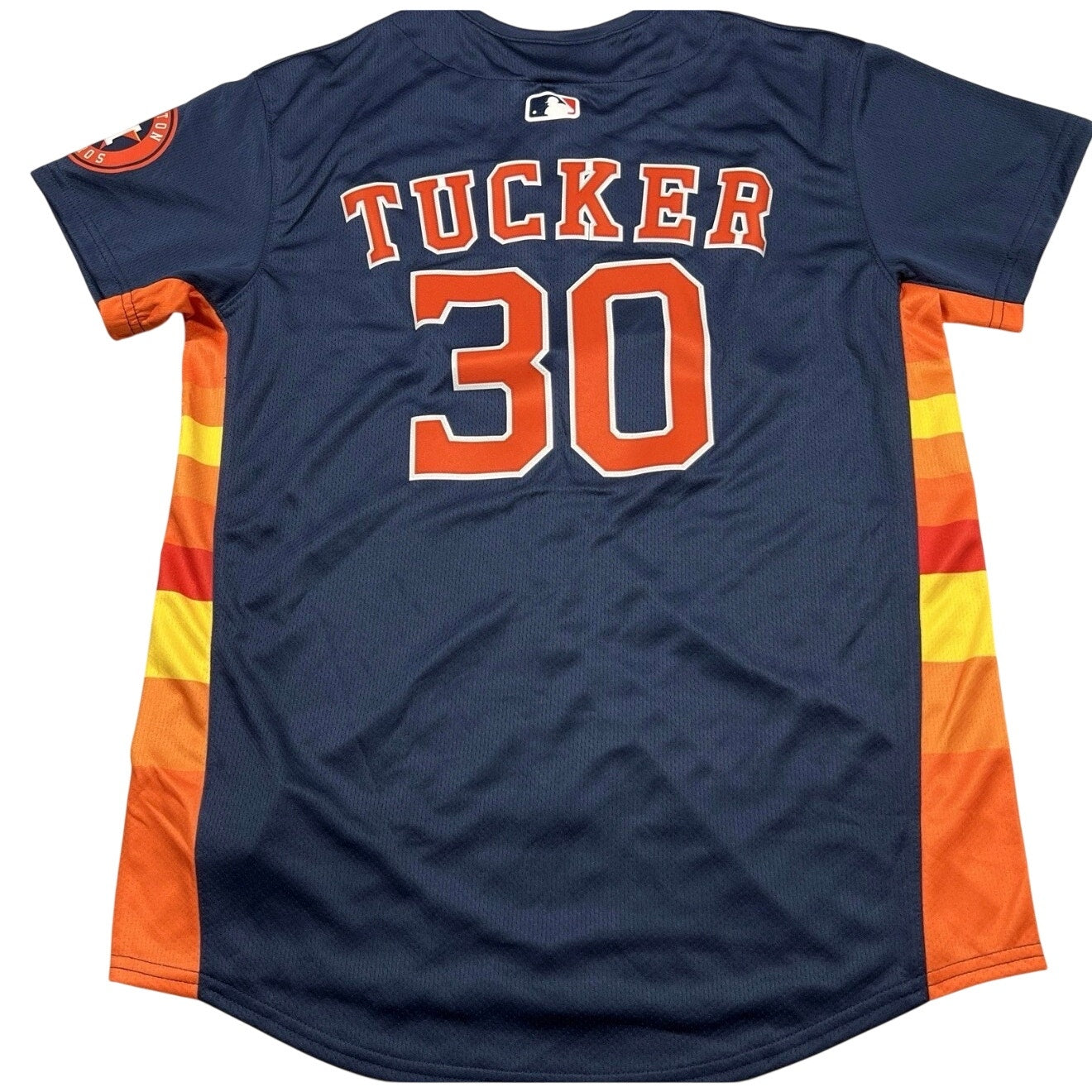 Nike Houston Astros Kyle Tucker youth MLB jersey in large size, featuring team logo and player name on the front.