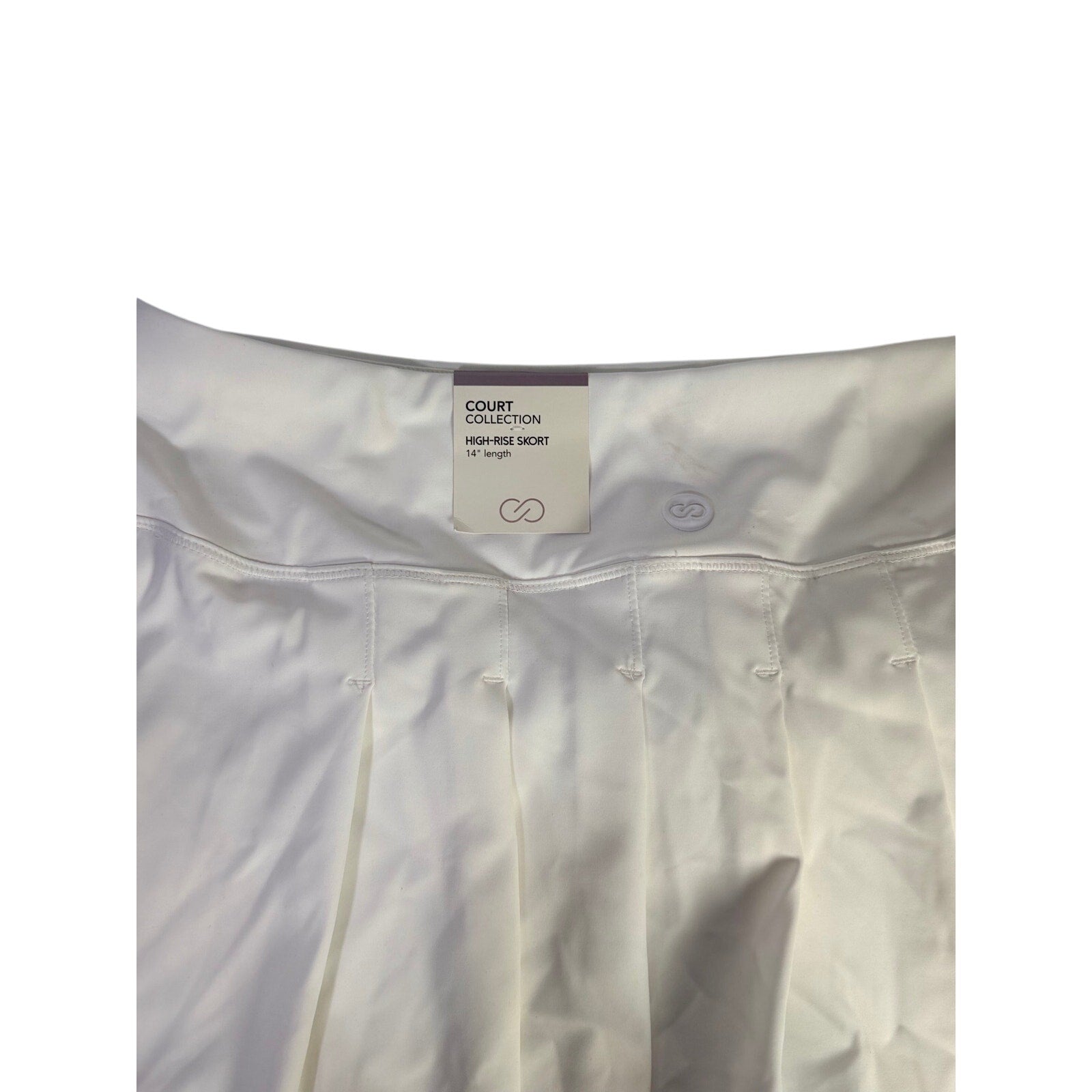 CALIA Women's Court Collection high-rise white skort, 14-inch length, size XL, with built-in shorts and sporty design.