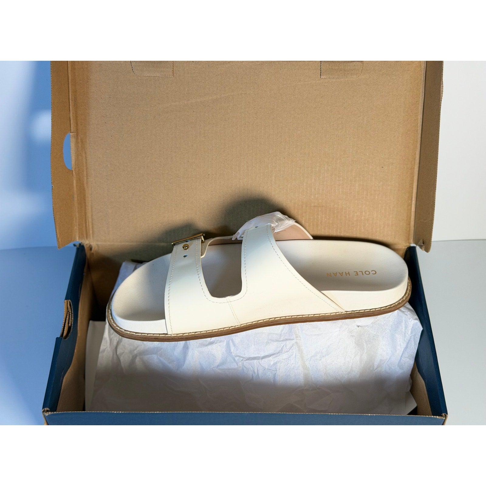 Cole Haan women's white leather buckle slide sandals with open toes and block heels, size US 9B, new in box.