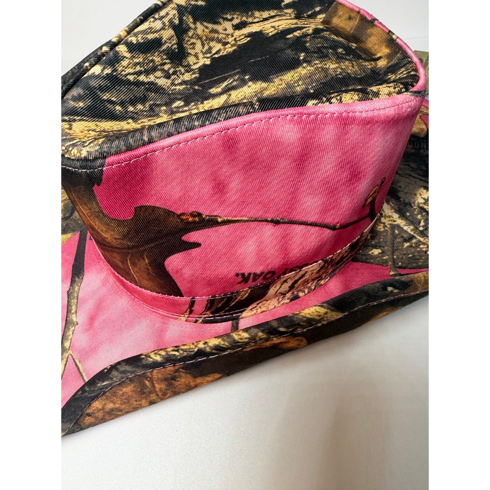 Peter Grimm Mossy Oak pink camo western cowboy hat with snap-up brim, featuring a stylish western design for women.