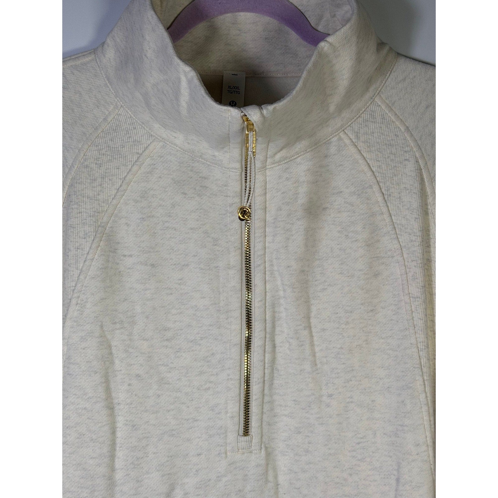 Lululemon women's heathered gray scuba oversized funnel neck half zip sweatshirt in XL/XXL size, showcasing the relaxed fit and collar detail.