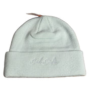 Mint Bad Birdie cuffed knit beanie with embroidered script logo, featuring a cozy, stretchy hat design in a stylish winter accessory.