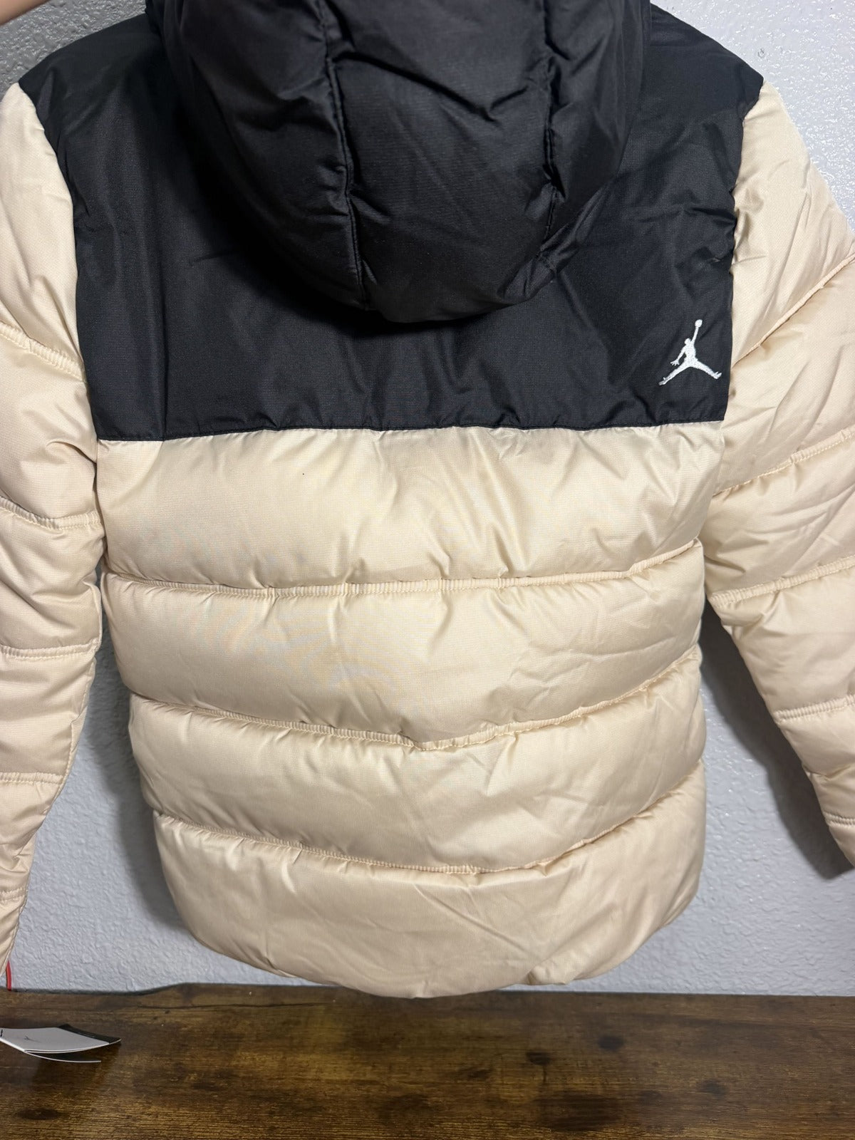 Jordan Jumpman hooded puffer jacket for boys in Legend Light Brown and Black, featuring a padded design and front zipper closure.