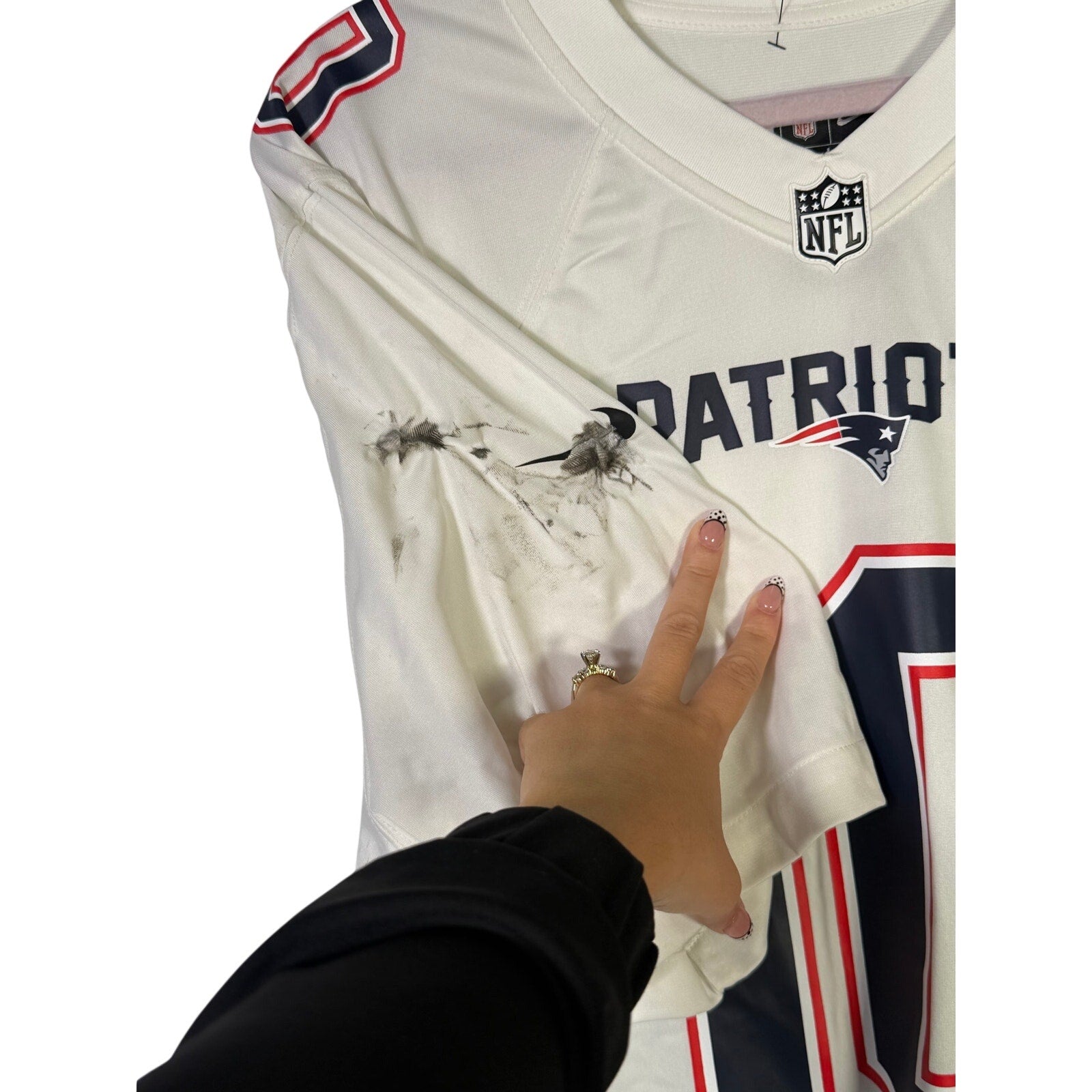 Nike NFL New England Patriots Drake Maye #10 white men's jersey, large size, featuring team logo and player name.