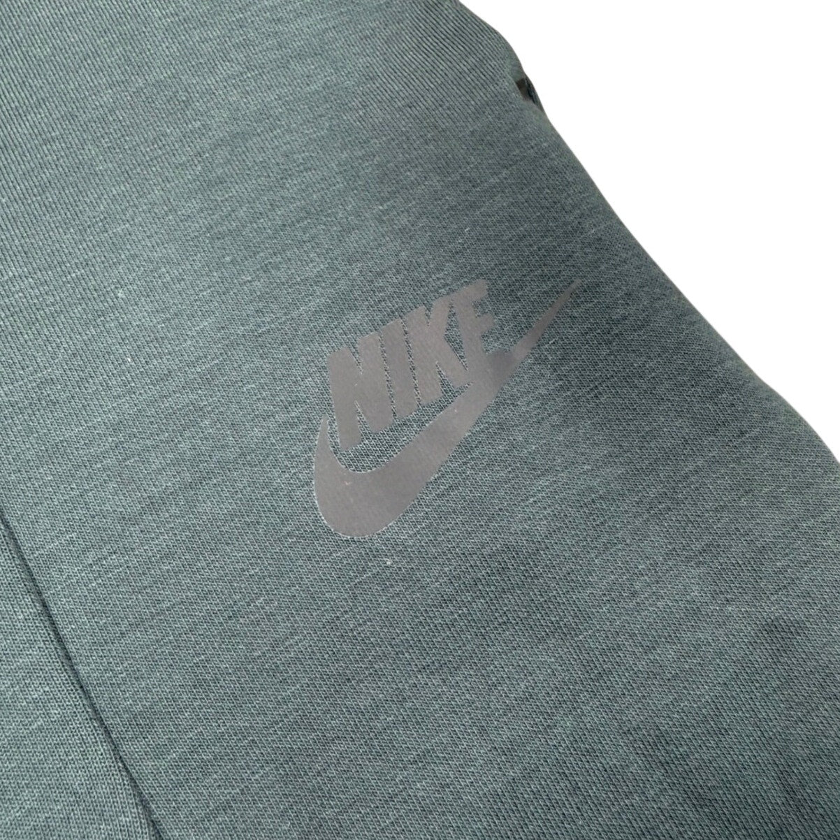 Nike women's slim fit knee-length athletic skirt in small size, featuring a sleek design for active wear.