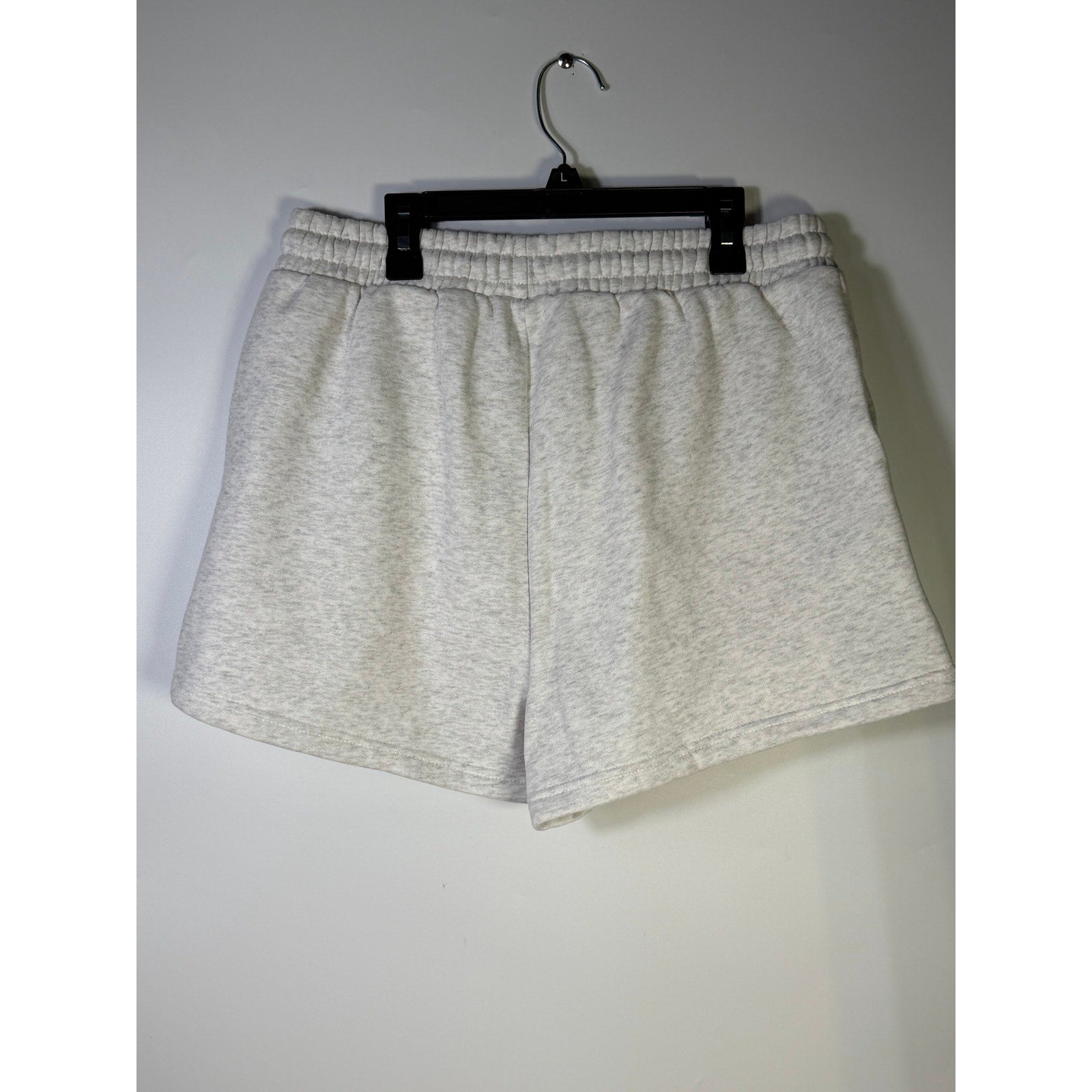 White marle fleece jog shorts by WILO The Label, women's size small, showing the relaxed fit and soft fabric details.