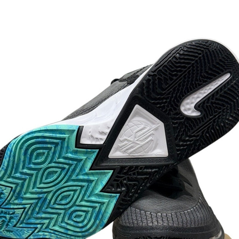 Nike Kyrie Infinity 8 basketball shoes in black and white, men's size 11, featuring sleek design and athletic detailing.