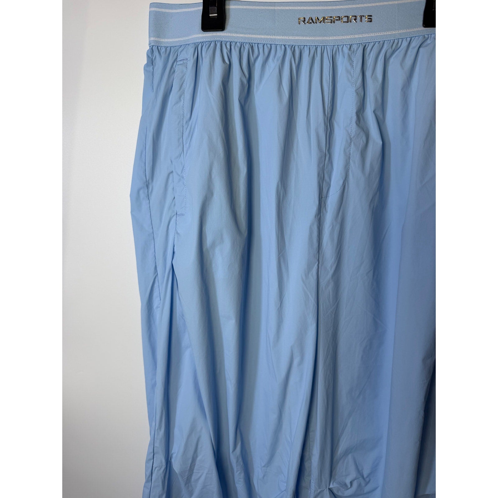 Light blue RAMSPORTS women's wide-leg pull-on pants in size M, showcasing comfortable, flowy fabric and wide-leg design.