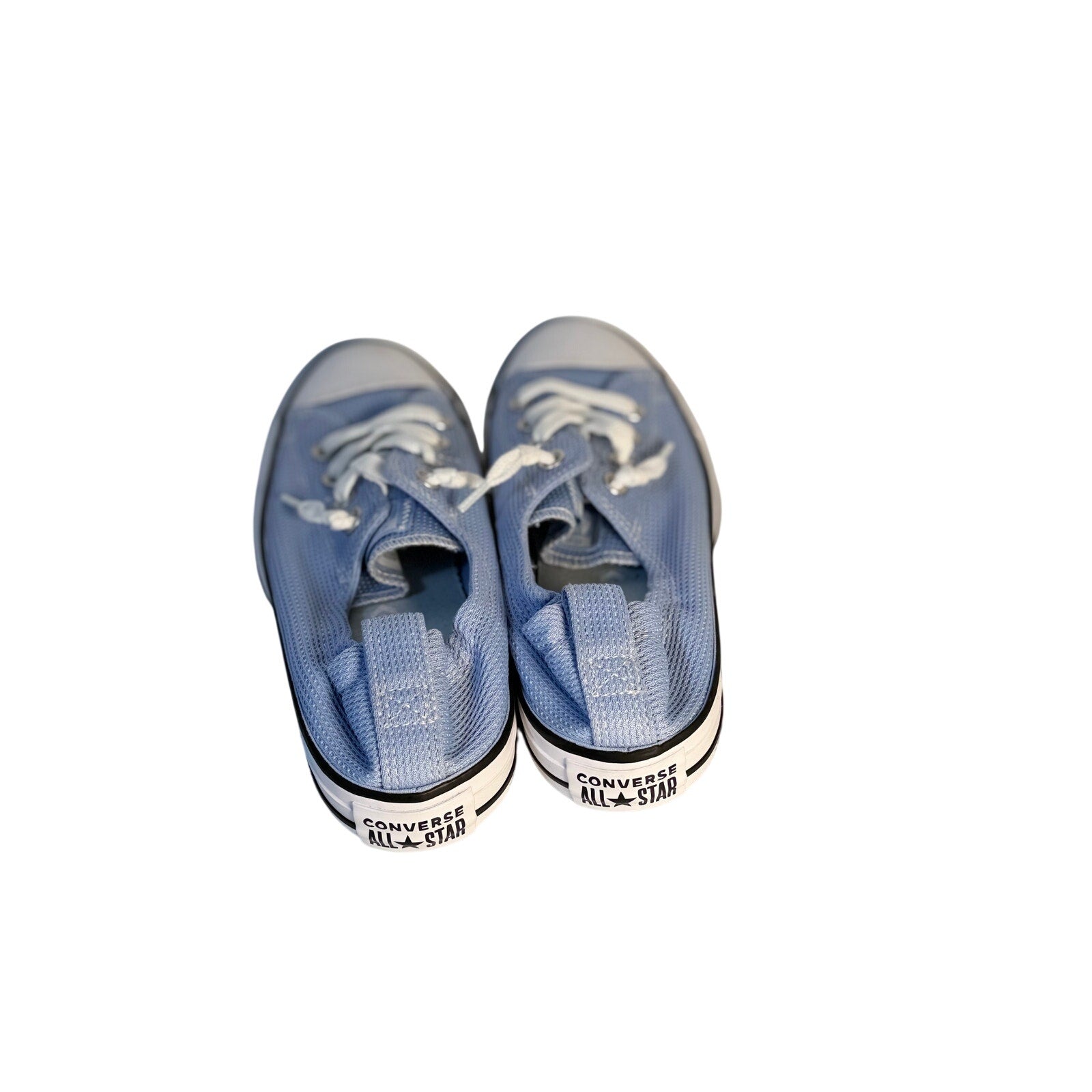 Light blue Converse Chuck Taylor All Star Shoreline slip-on sneakers for women, size 9, featuring canvas material and classic design.