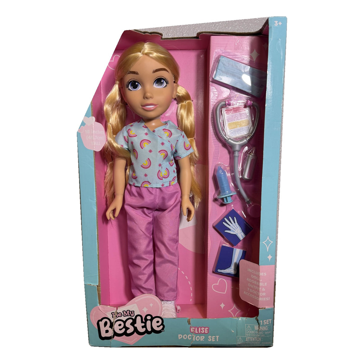 Be My Bestie Elise 18-inch doll in medical scrubs with seven doctor accessories, including stethoscope and medical tools.