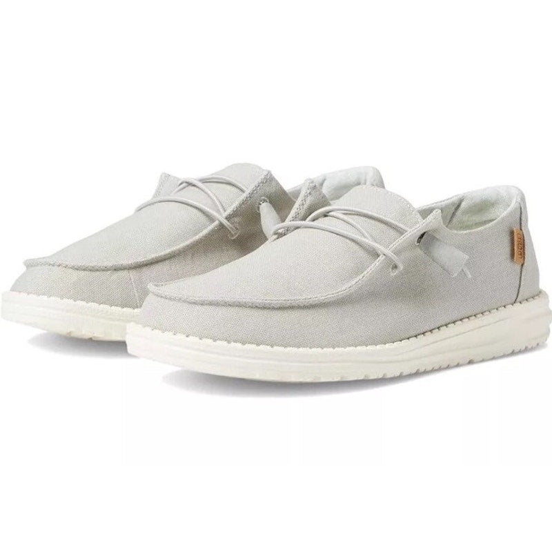 Hey Dude Wendy Chambray women's sneakers in light grey, size 8, featuring casual slip-on style and comfortable fabric upper.