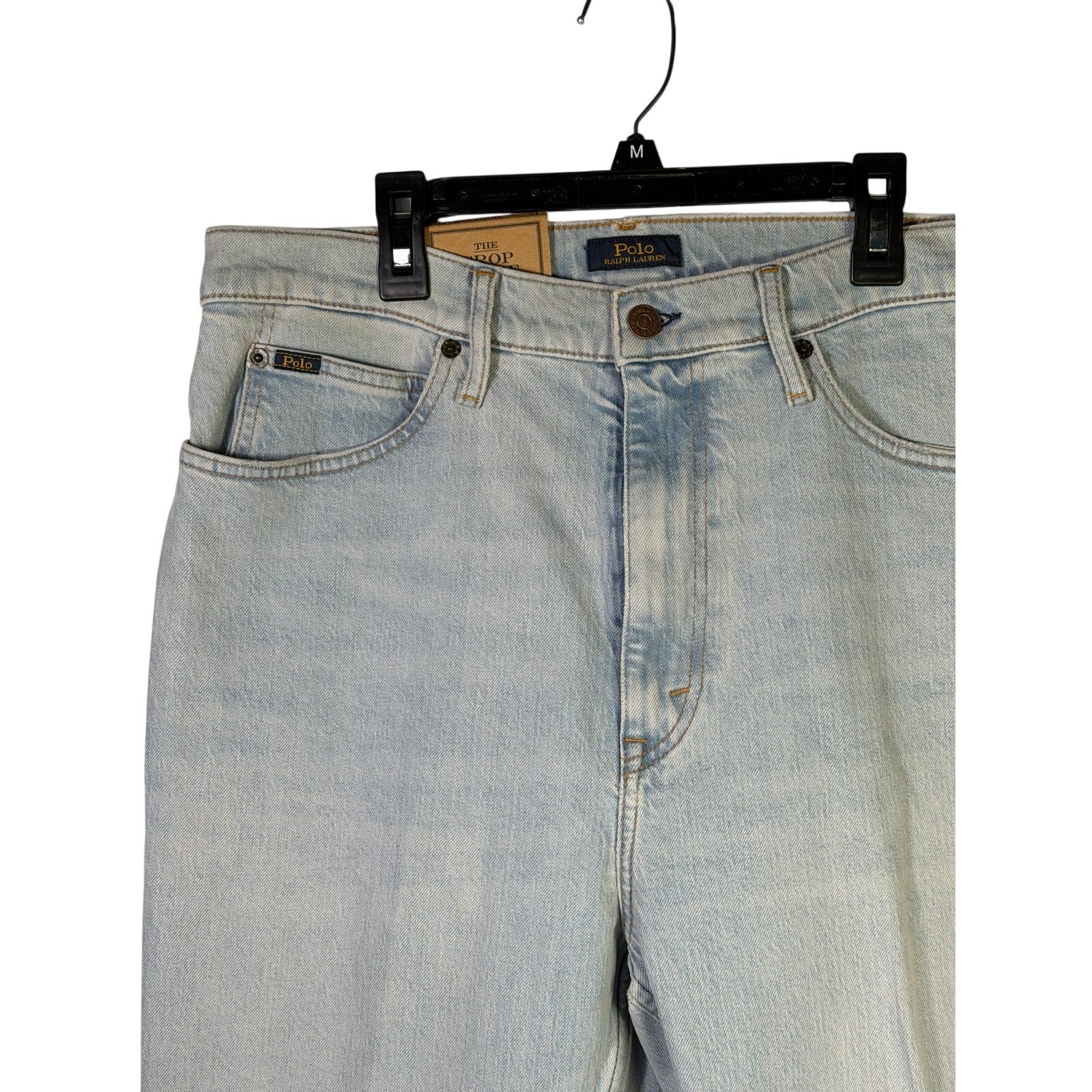 Light wash Polo Ralph Lauren crop flare jeans for women, size 31, with raw hem detail and classic fit.