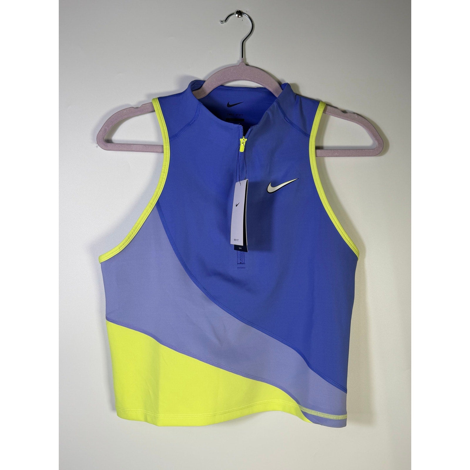 Nike women's blue and yellow quarter-zip cropped tank top, size L, with Nike logo visible, casual athletic style.