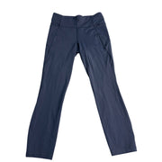 Navy Lululemon Athletica women's cropped leggings with a fitted waistband and smooth stretchy fabric, size 6.