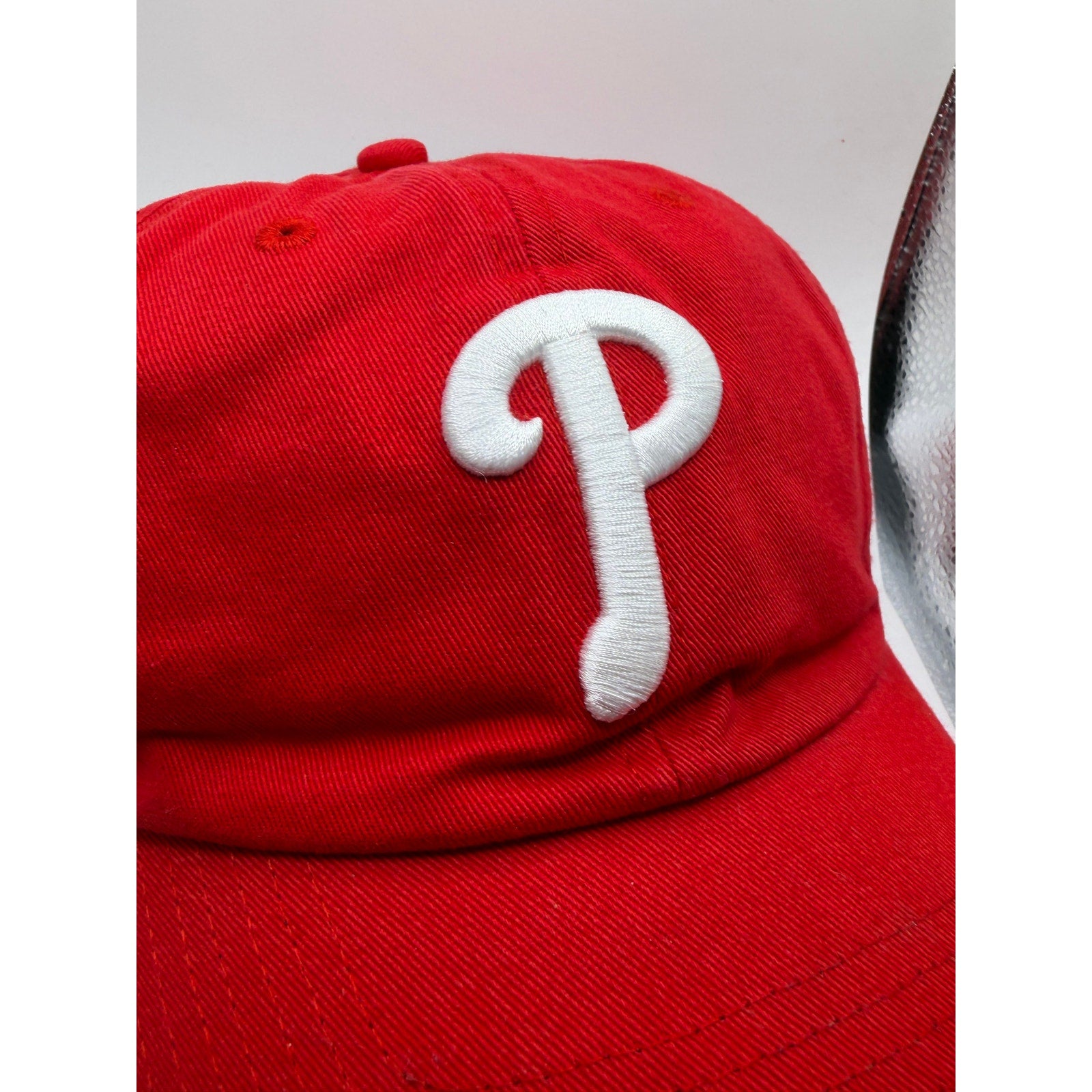 Red Philadelphia Phillies MLB ’47 adjustable strapback hat with USA flag design and one size fits all.