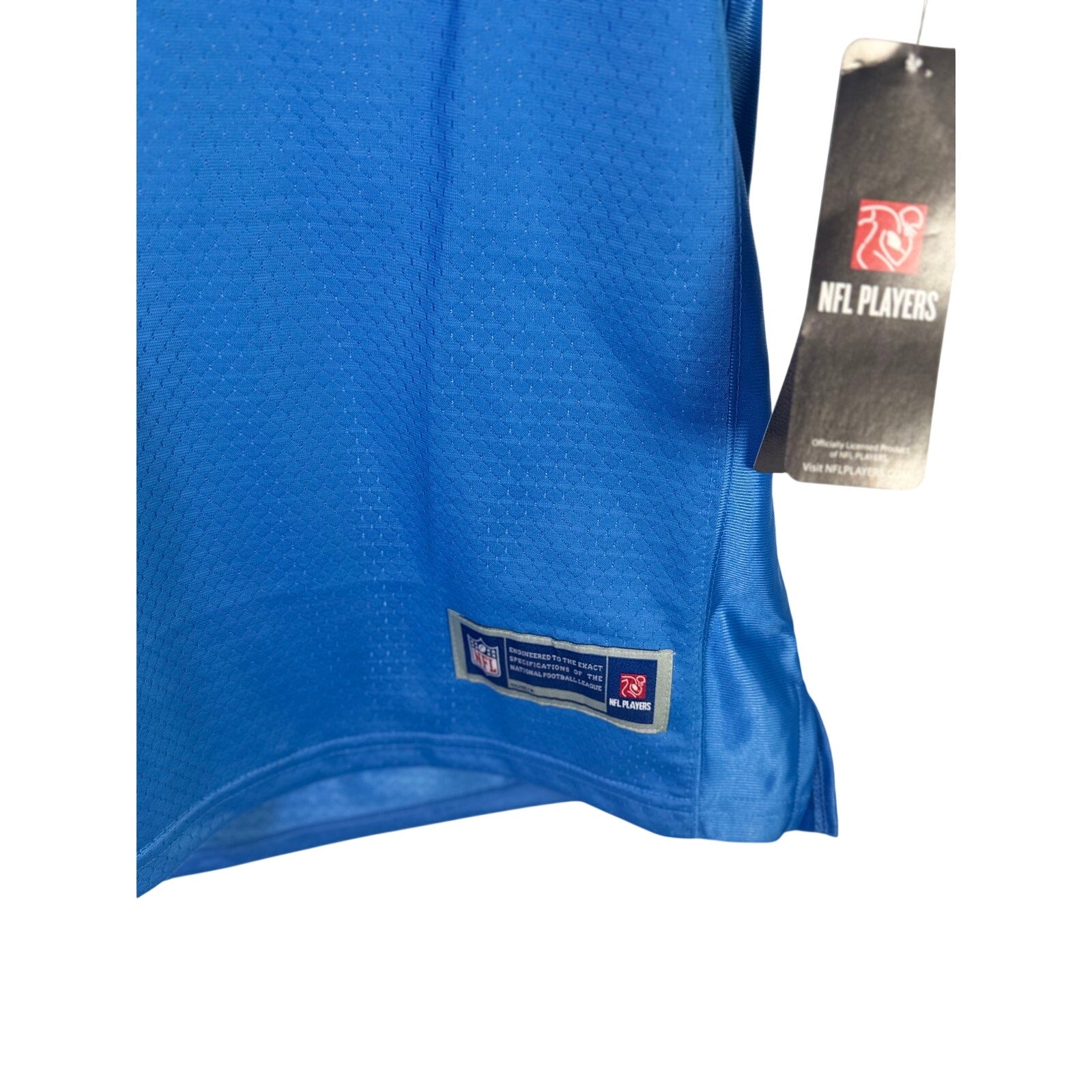 NFL Players Los Angeles Chargers women’s blue football jersey, size L, with team logo and NFL branding.