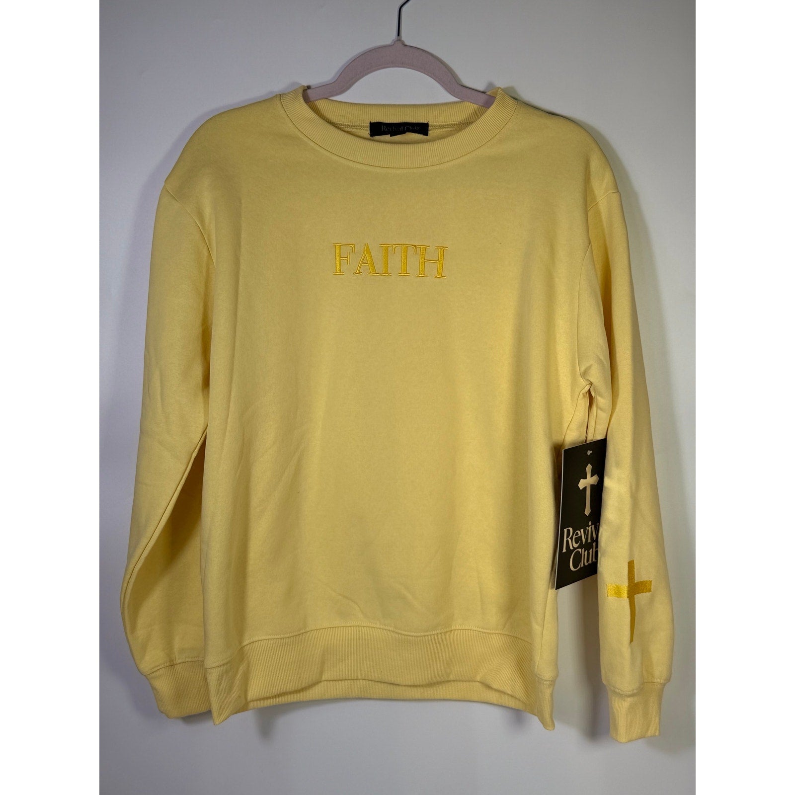 Yellow Revival Club Faith Cross crewneck sweatshirt in size S with Christian design, casual crewneck style, new with tags.