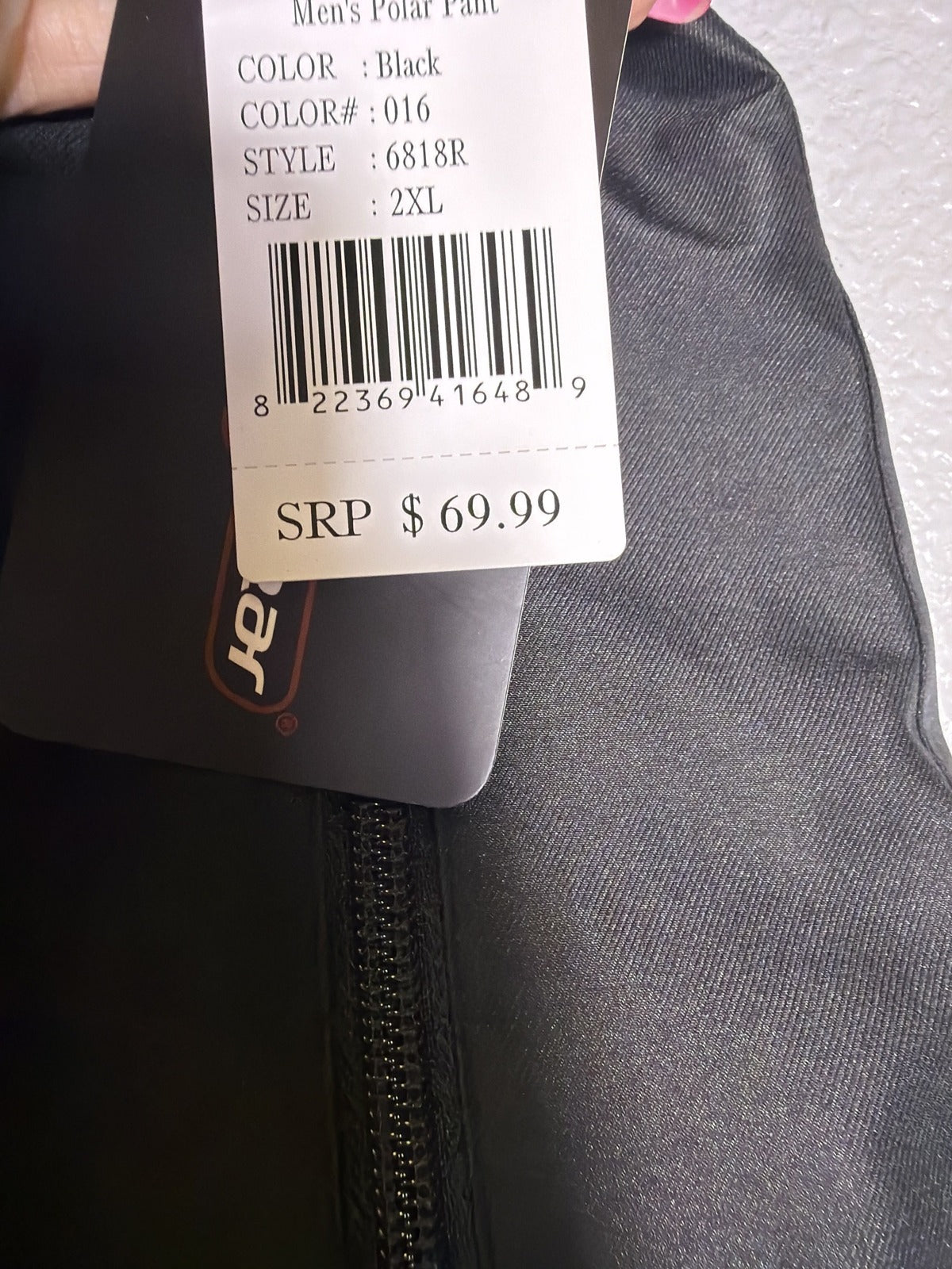 Black Outdoor Gear men's polar snow pants, insulated ski pants in size 2XL, showing the waterproof fabric and adjustable waistband.