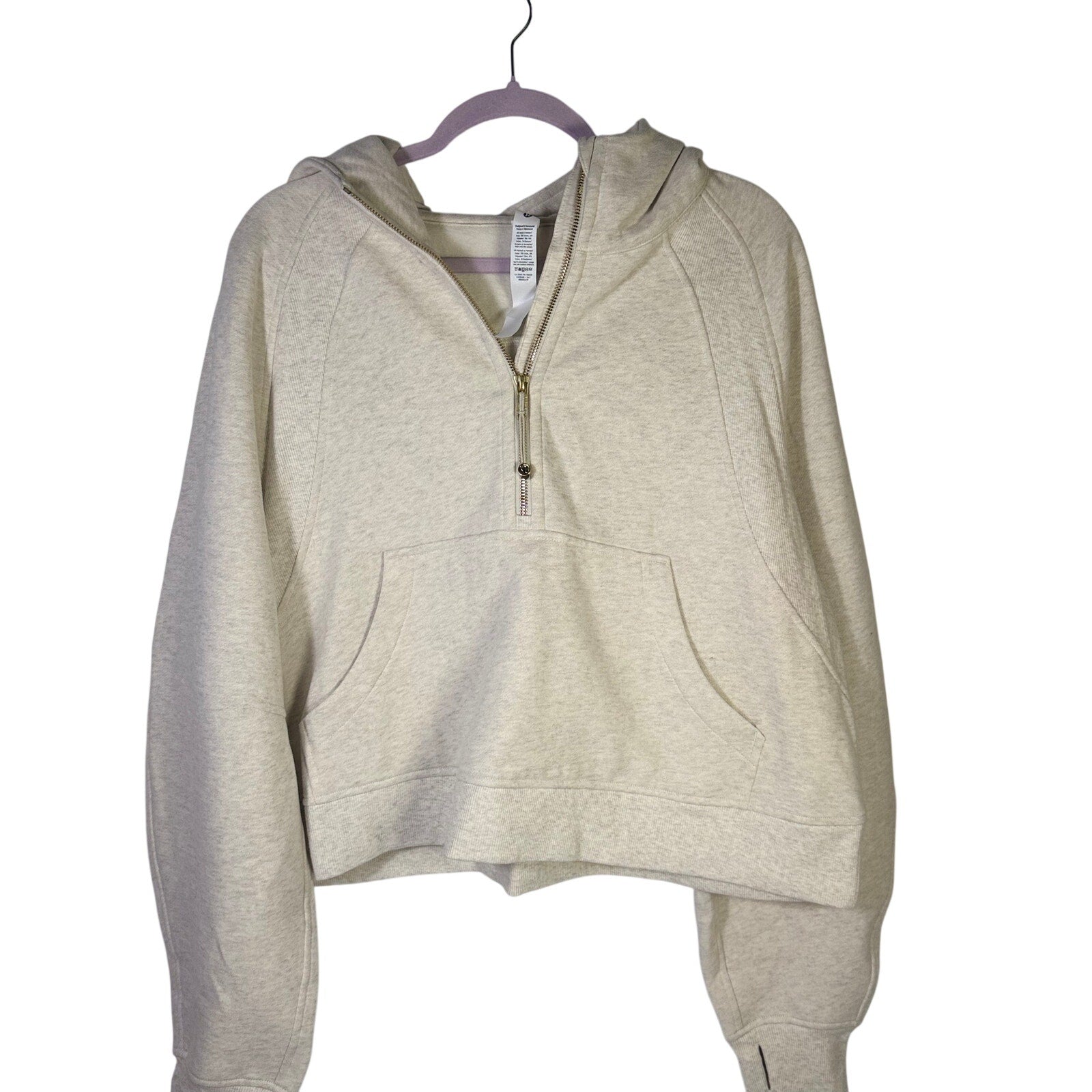 Lululemon Scuba oversized half-zip hoodie in heathered cream, size XL/XXL, displayed on a hanger.