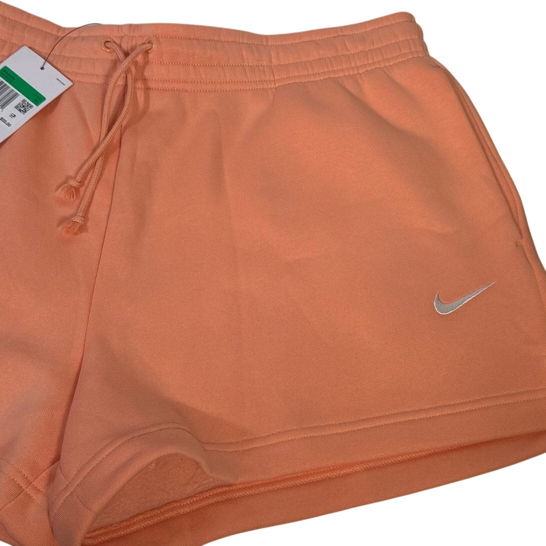 Nike women’s peach orange fleece drawstring shorts, size XL, casual athletic shorts with a comfortable fit and relaxed style.