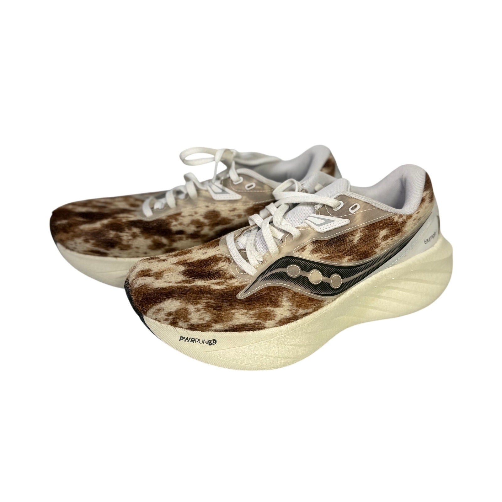 Saucony Women’s Endorphin Shift 3 Runshield cow print athletic running shoes, size 9, with protective weather-resistant features.