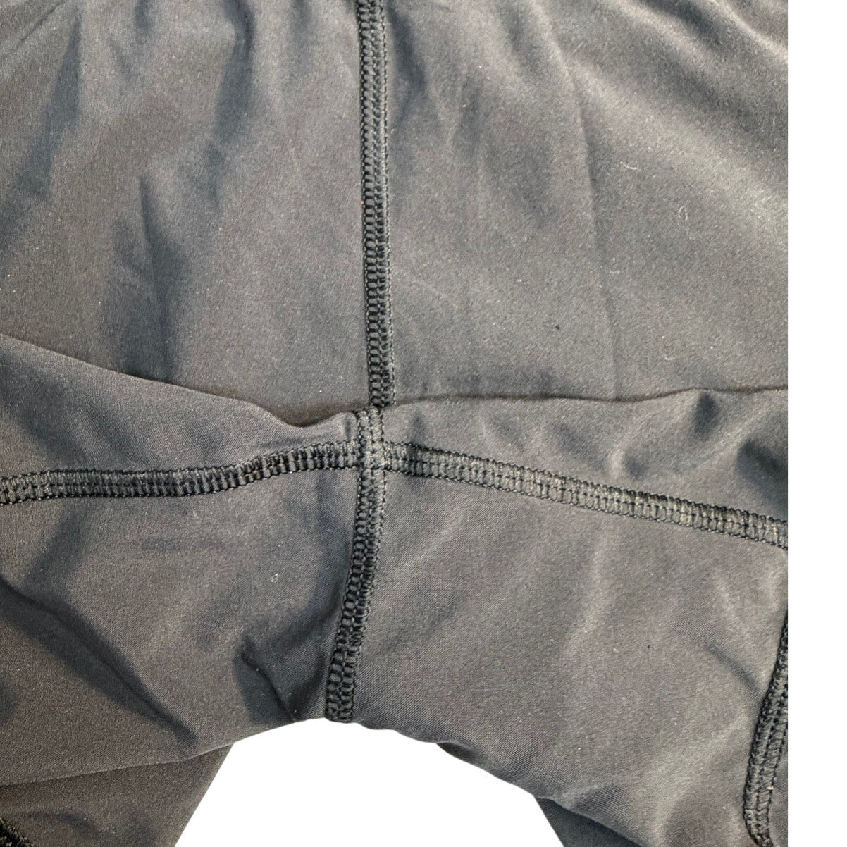 Lululemon women's black running shorts with zip back pocket, size 8, lightweight athletic shorts for active wear.