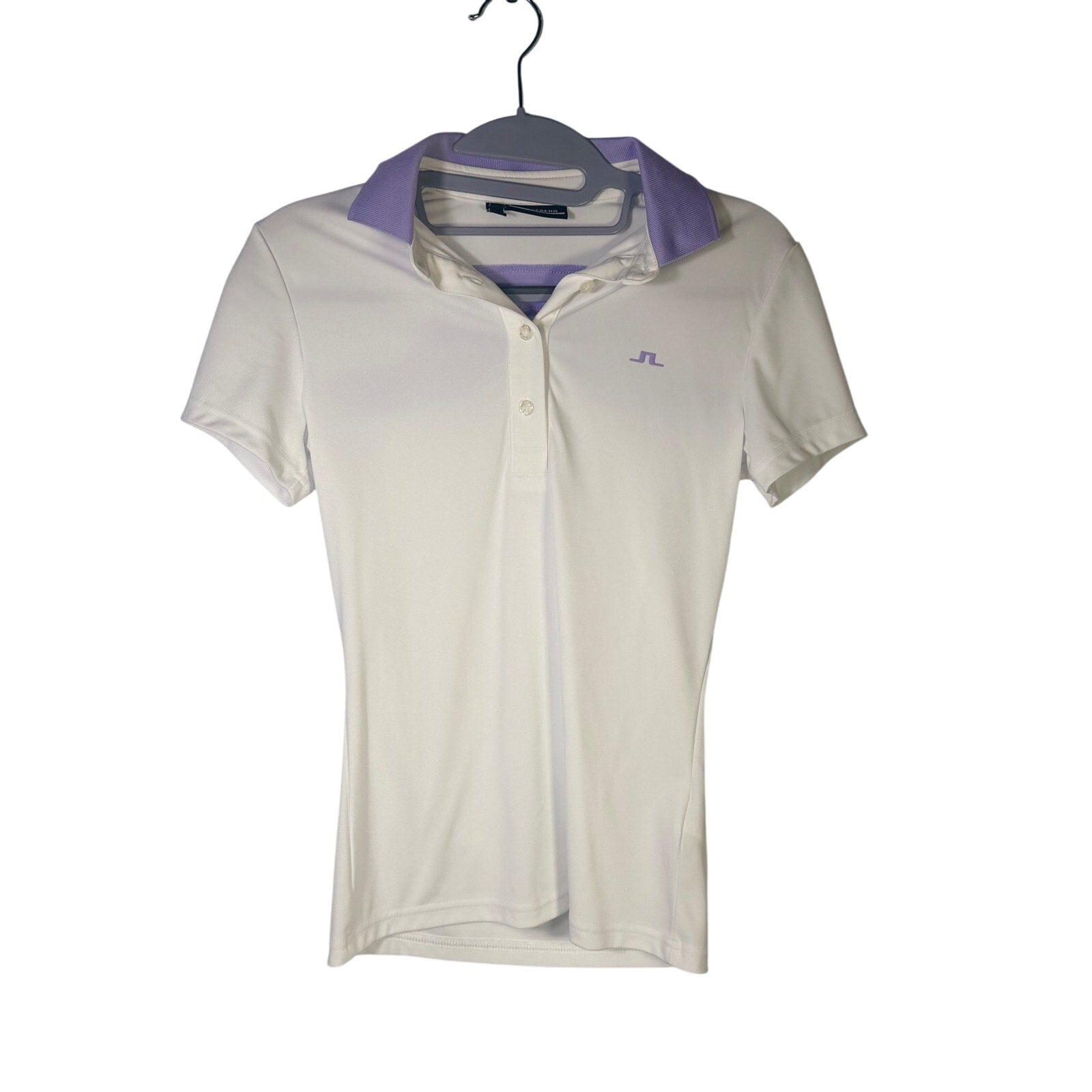 J.Lindeberg women’s white and lavender short sleeve golf polo shirt, size XS, made of breathable fabric.