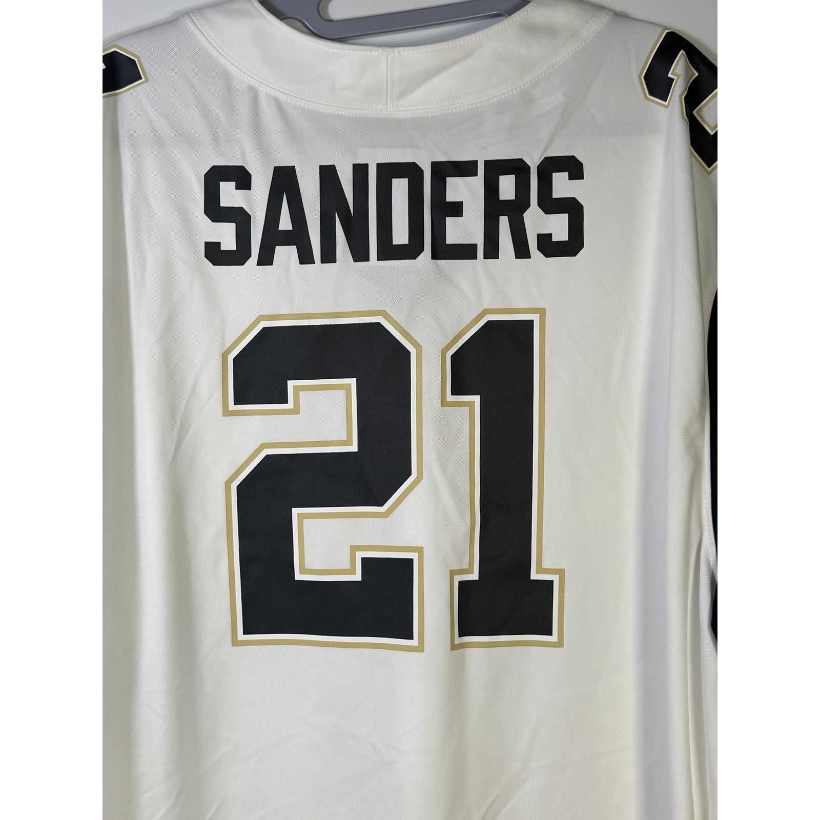 Nike PRIME Deion Sanders #21 football jersey, men's 2XL, white, Nike brand, featuring player number and team details.