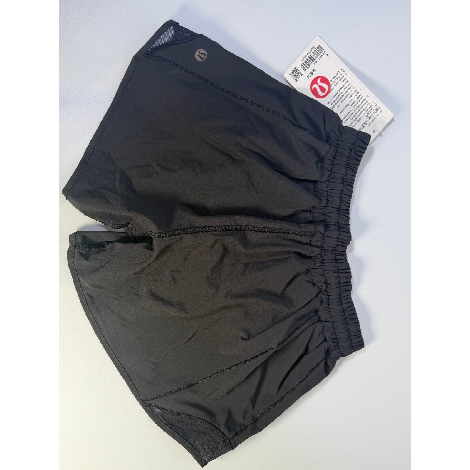 Lululemon Hotty Hot low rise lined shorts in black, women's size 4, showing the front view of the athletic shorts.
