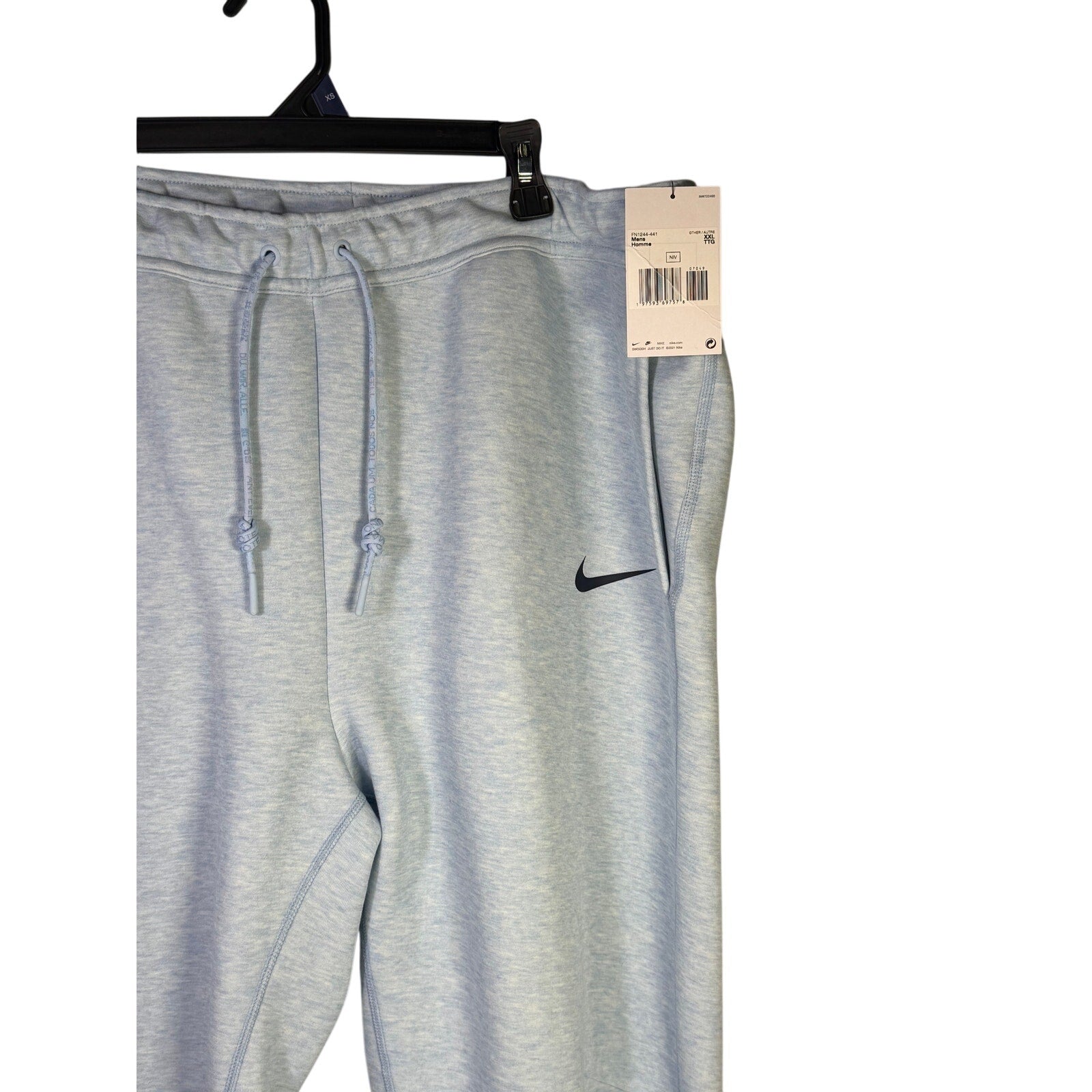 Light blue Heather Nike Sportswear Tech Fleece jogger pants for men in XXL, featuring a comfortable fit and sporty design.