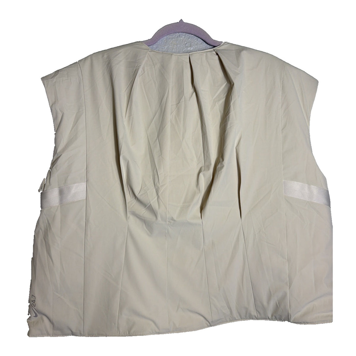 Nike 24.7 Reversible Quilted Puffer Vest for women in sail and cream, showing the front view with quilted design and reversible style.