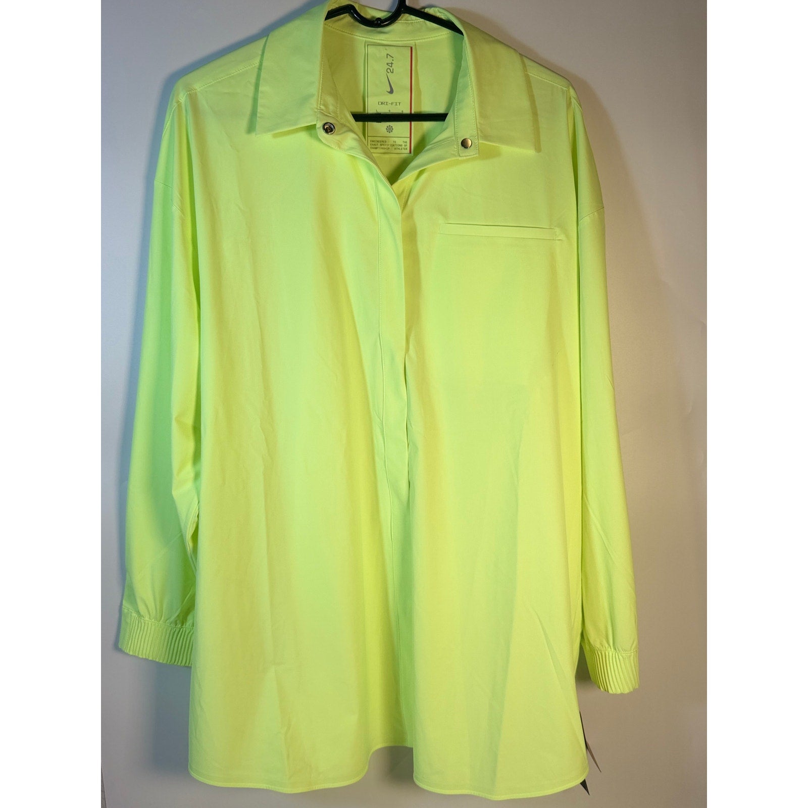 Nike 24.7 Dri-FIT women's training dress in volt green, large size, lightweight athletic shirt dress with short sleeves.