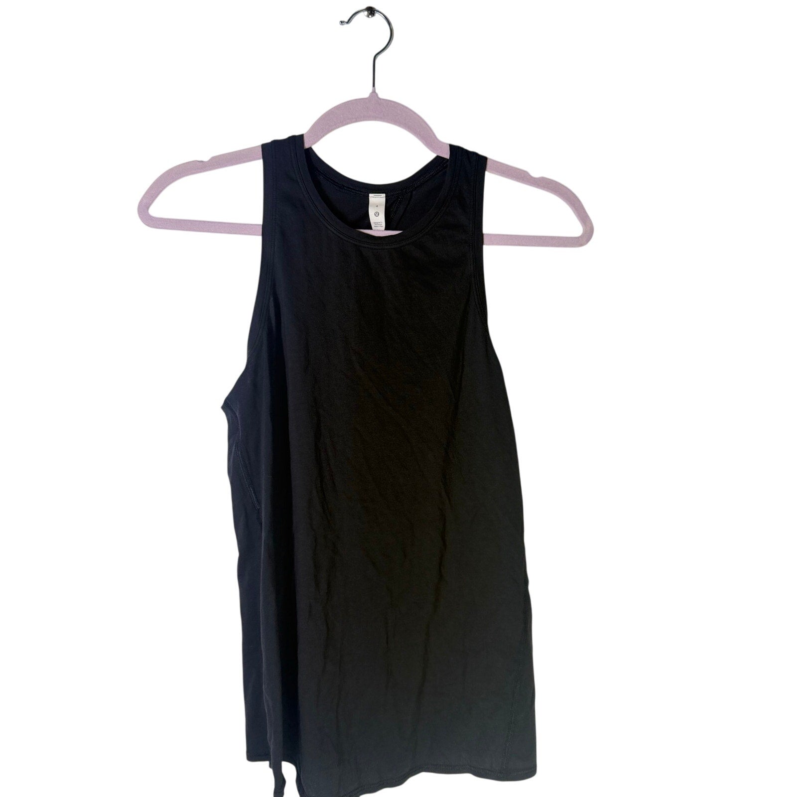 Black Lululemon women’s high-neck open-back athletic tank top, size 4, featuring a sleek design and breathable fabric.