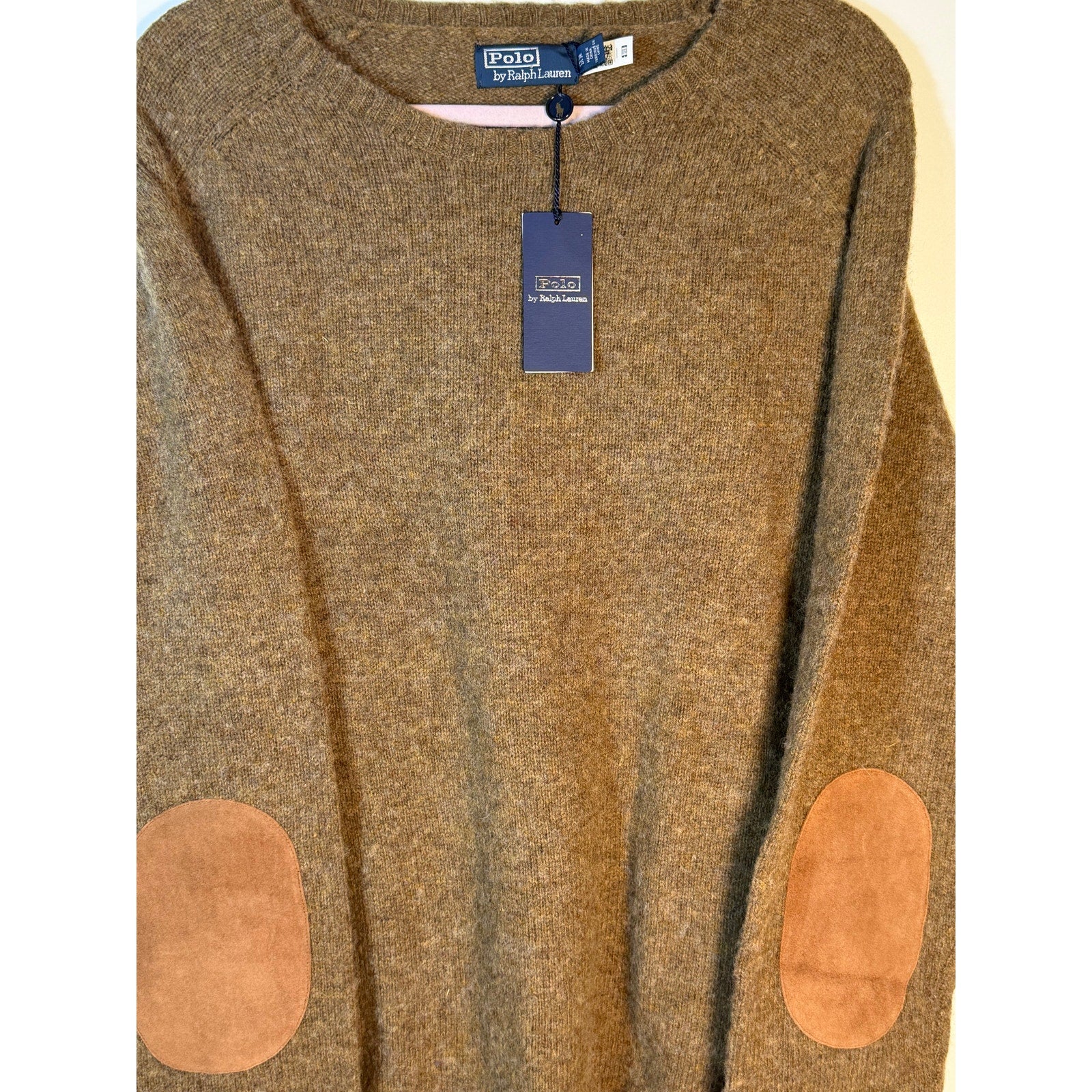 Polo Ralph Lauren men's brown crewneck wool sweater with aviator design, size XXL, new with tags, shown on a model.