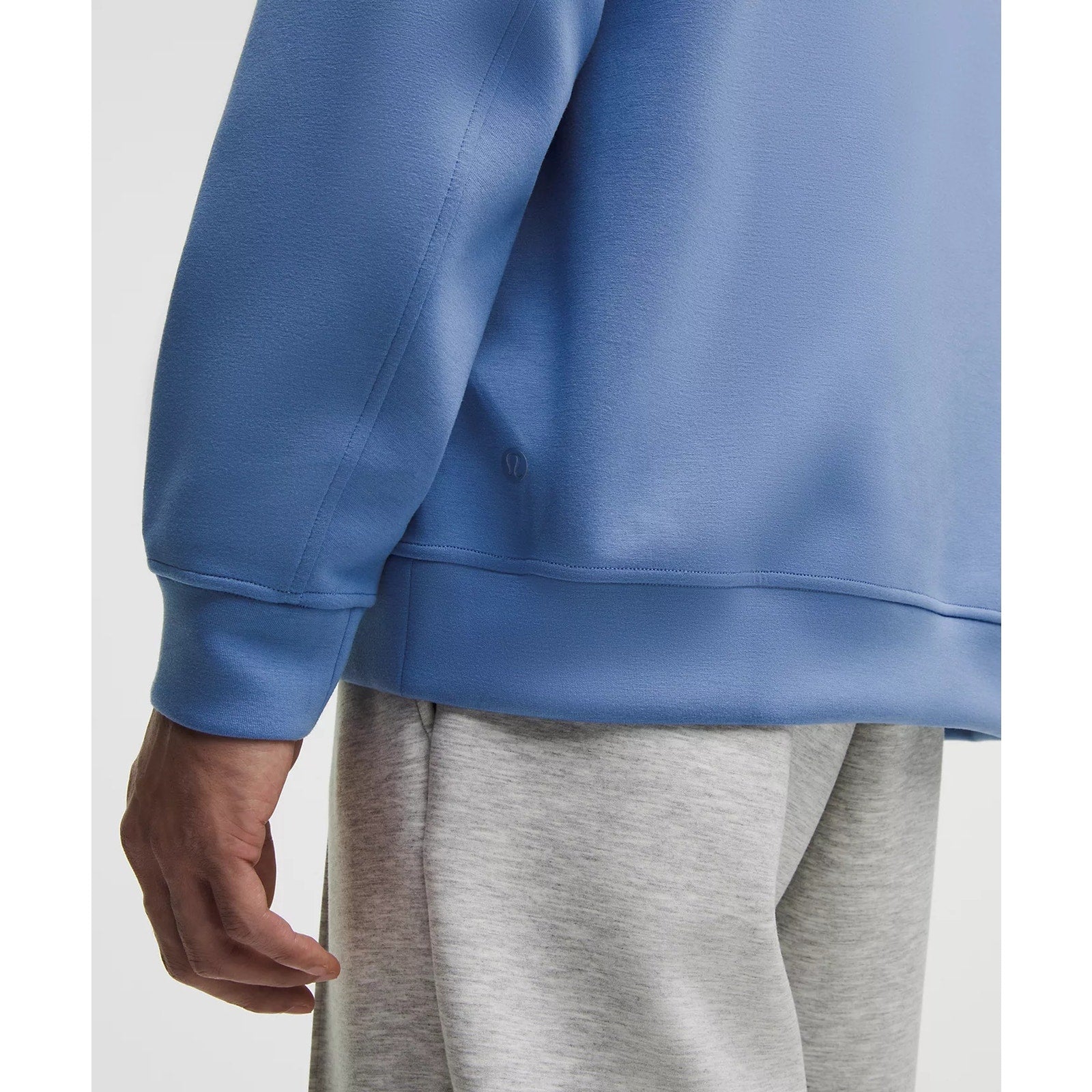 Men's blue Lululemon Smooth Spacer pullover hoodie, size XL, showing the lightweight, textured fabric and relaxed fit.