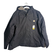 Black Carhartt women's loose fit washed duck hooded jacket with sherpa lining, shown on a hanger.