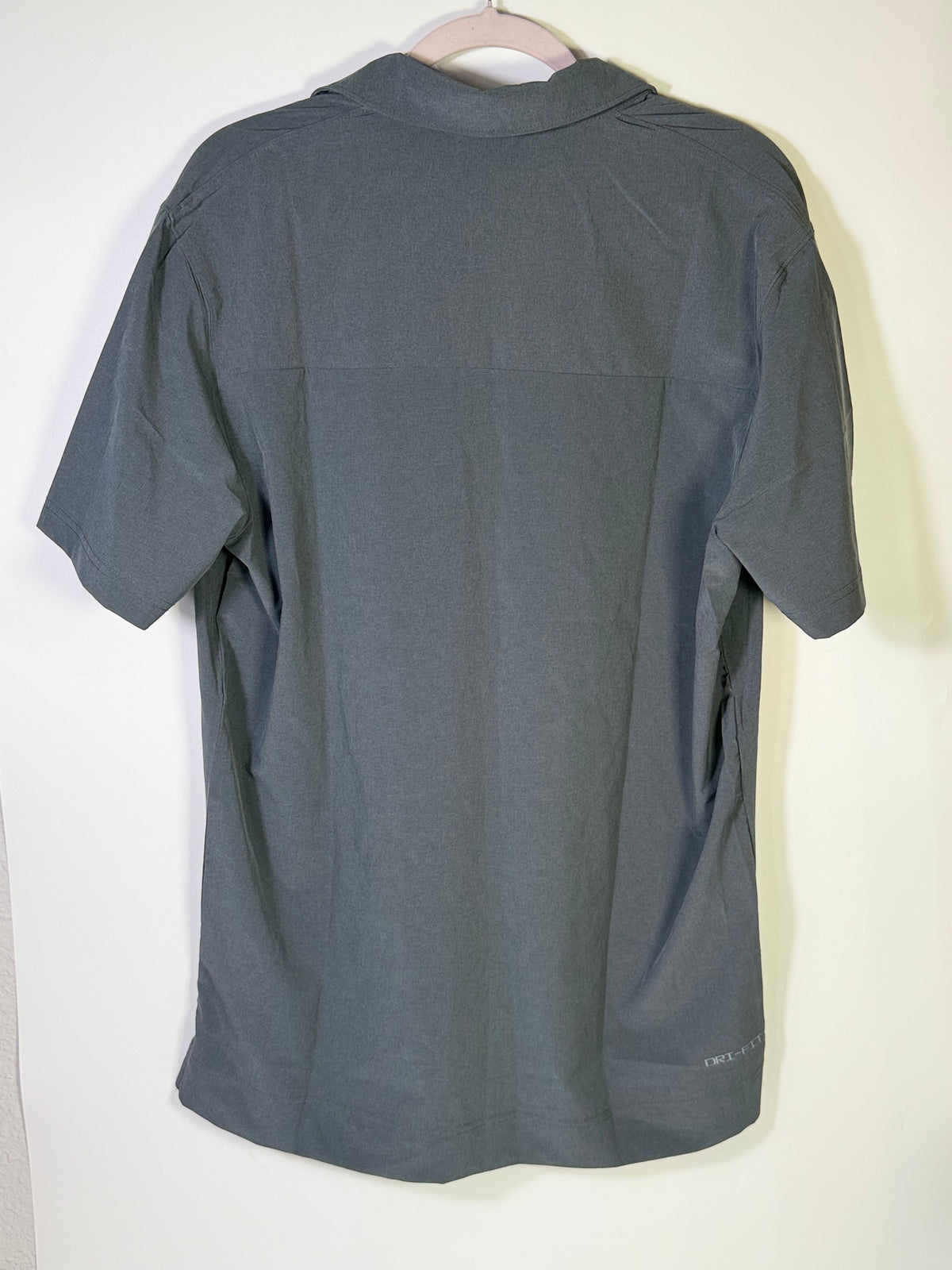 Men's Nike Dri-FIT Football Sideline Polo in gray, large size, showing the lightweight, breathable athletic polo shirt.