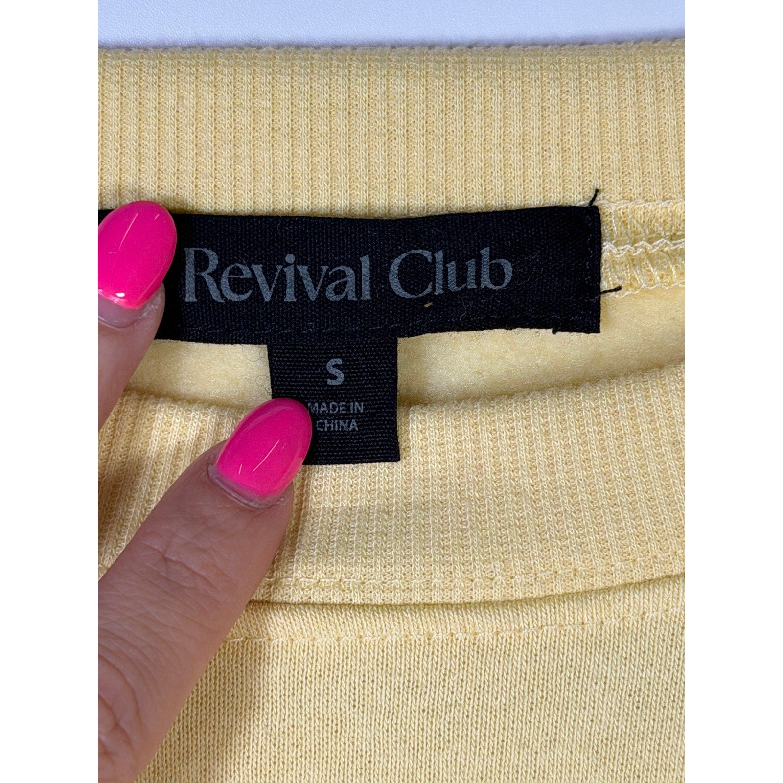 Yellow Revival Club Faith Cross crewneck sweatshirt in size S, featuring a Christian cross design on the front.