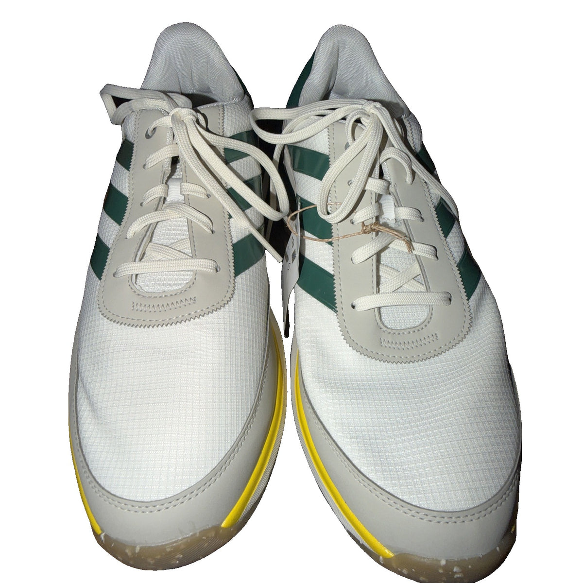 adidas men's spikeless golf shoes in cream green and yellow, size 13, new with tags, showcasing the stylish design and breathable material.