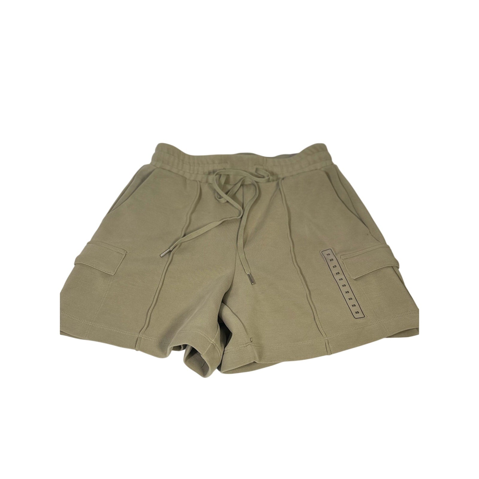 Calia women's sage green cargo shorts with drawstring waist, size XS, featuring utility pockets and casual style.