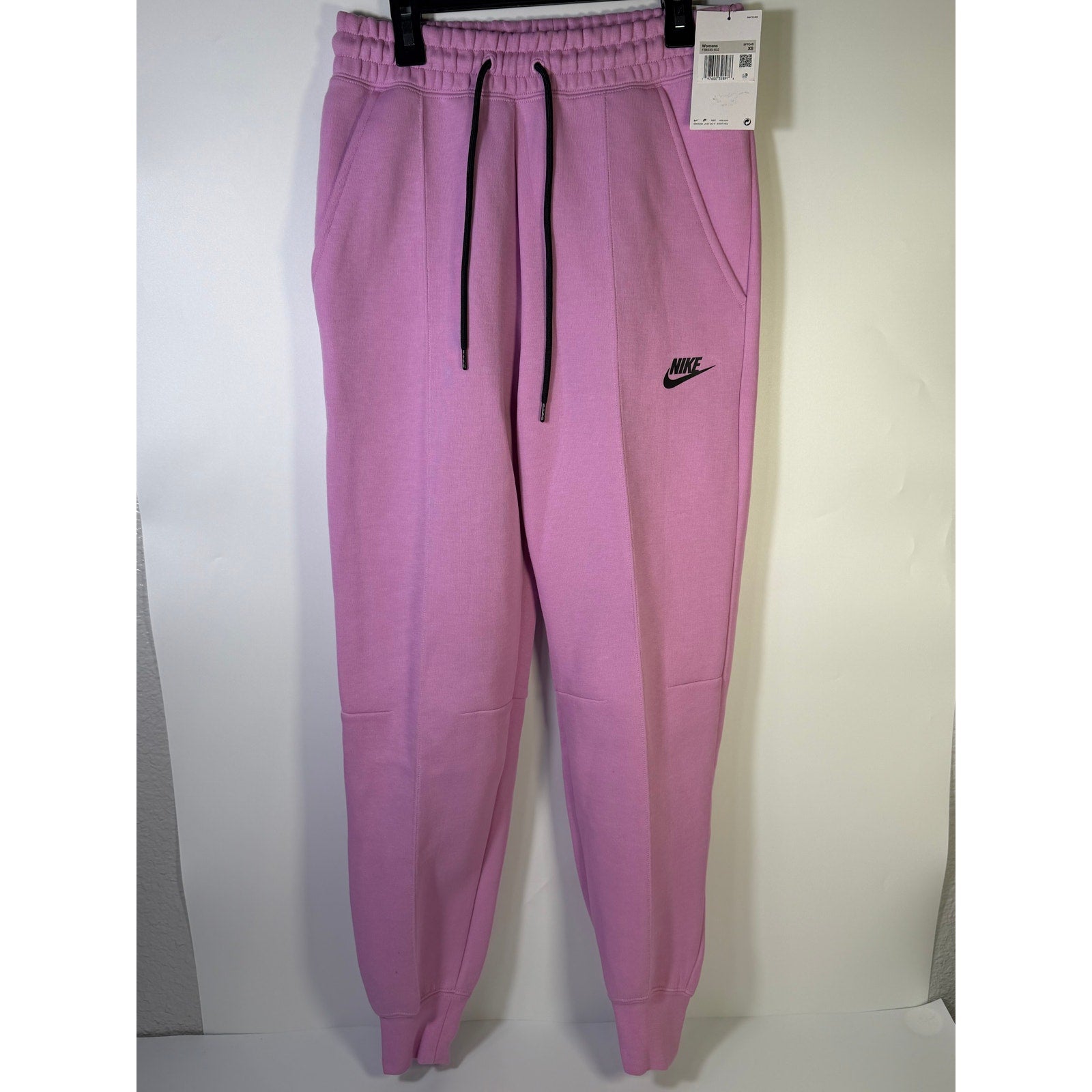 Nike Sportswear Phoenix fleece jogger sweatpants for women, pink mid-rise XS, soft and comfortable athletic loungewear.