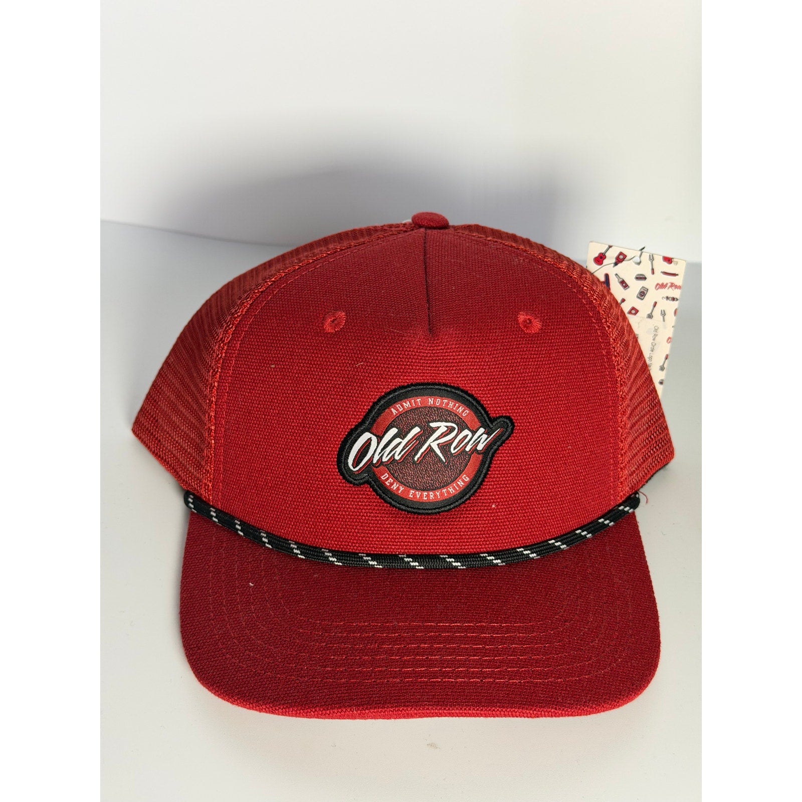 Old Row Red Rope Trucker Snapback Hat with adjustable strap, featuring a classic trucker style and bold red rope detail.